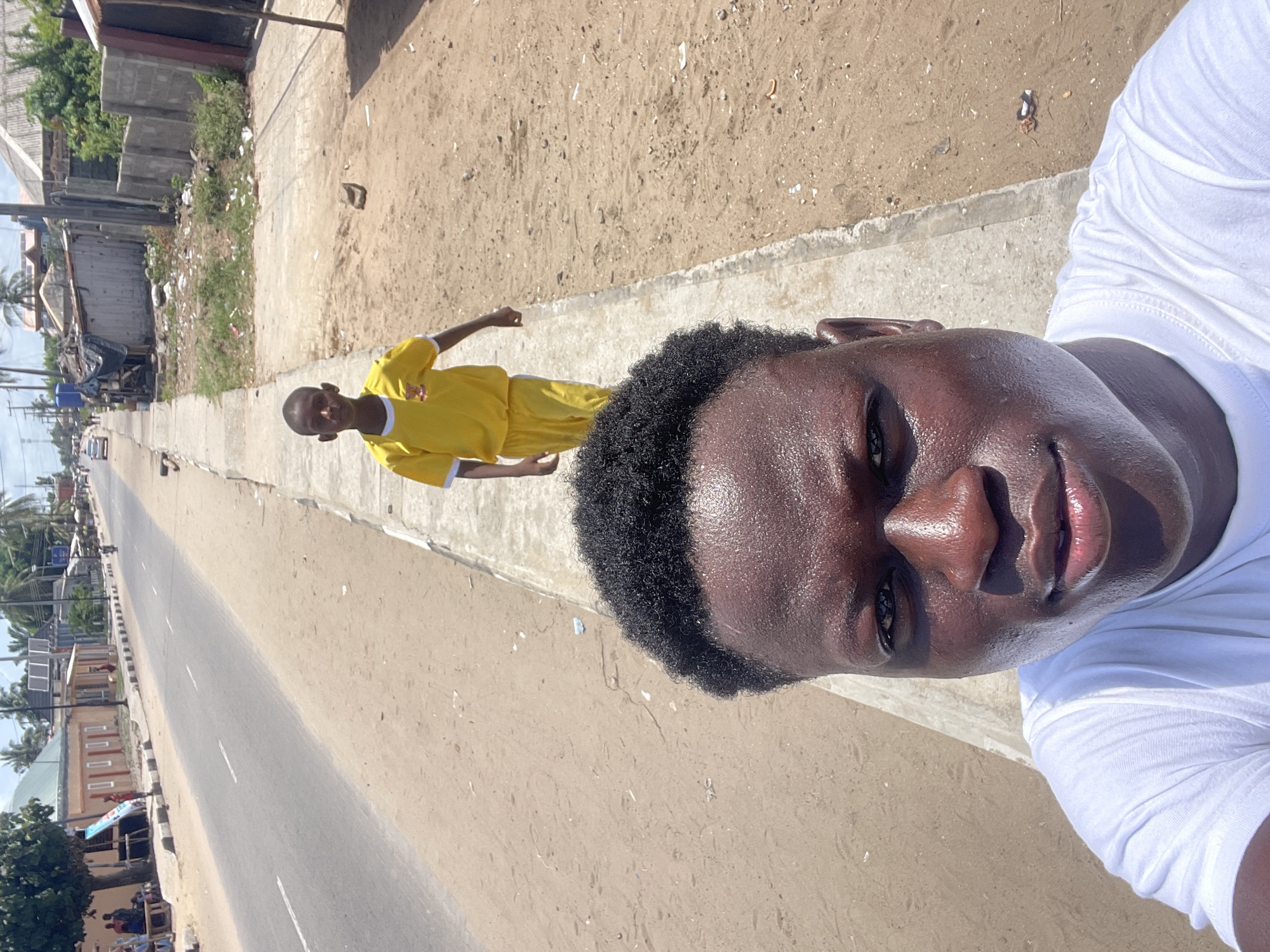 Daily life documented in Badagry, Nigeria during sunny afternoon
