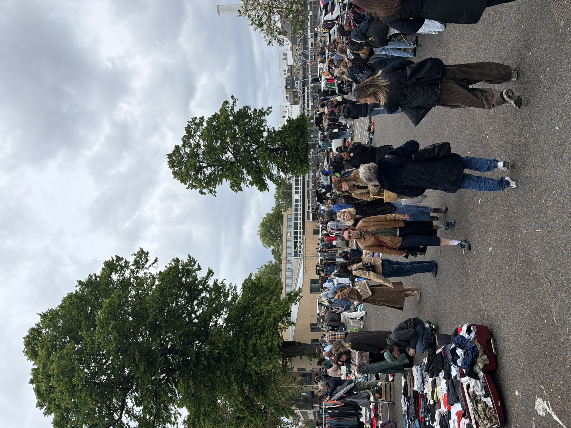 Outdoor market operates with vendors and shoppers in London