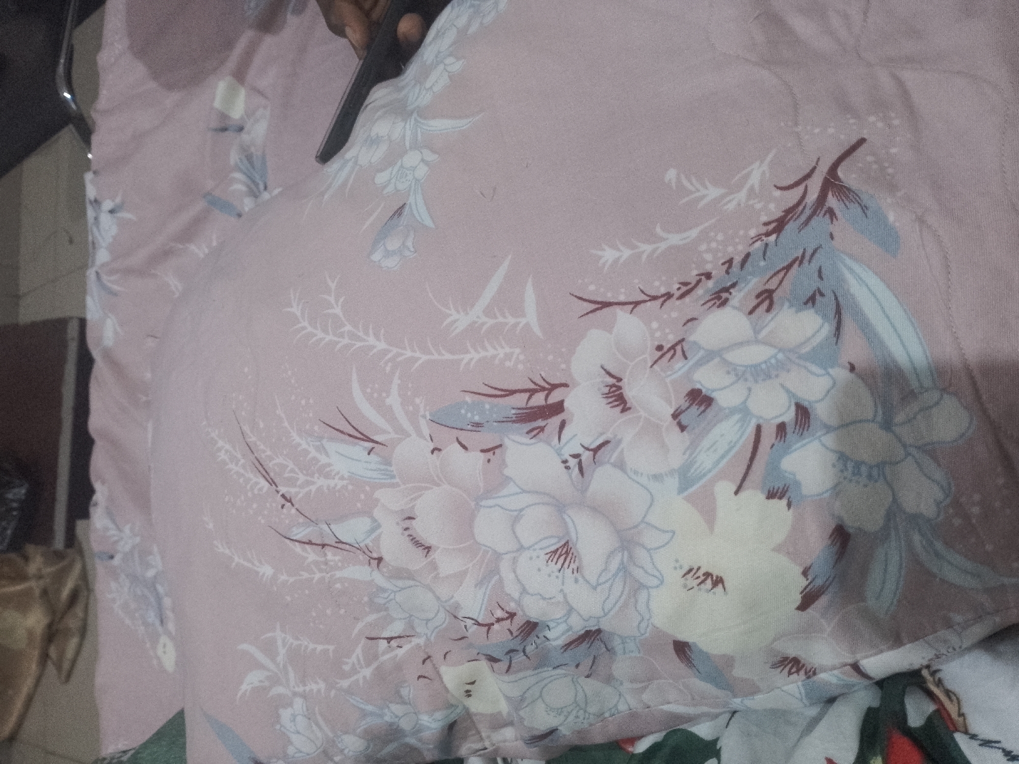 Intimate documentation of personal belongings in bedroom setting