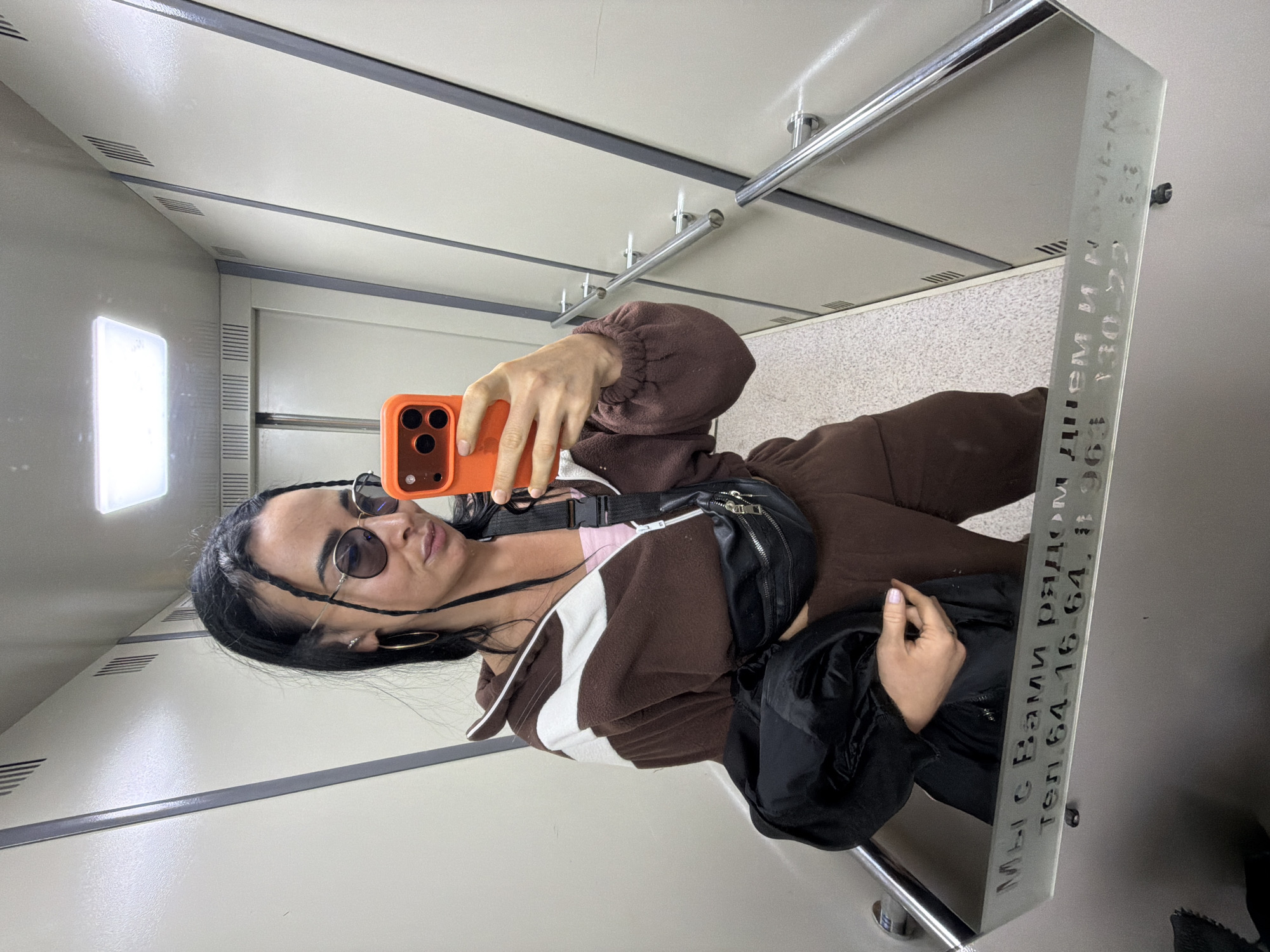 Woman takes multiple selfies across Veliky Novgorod locations