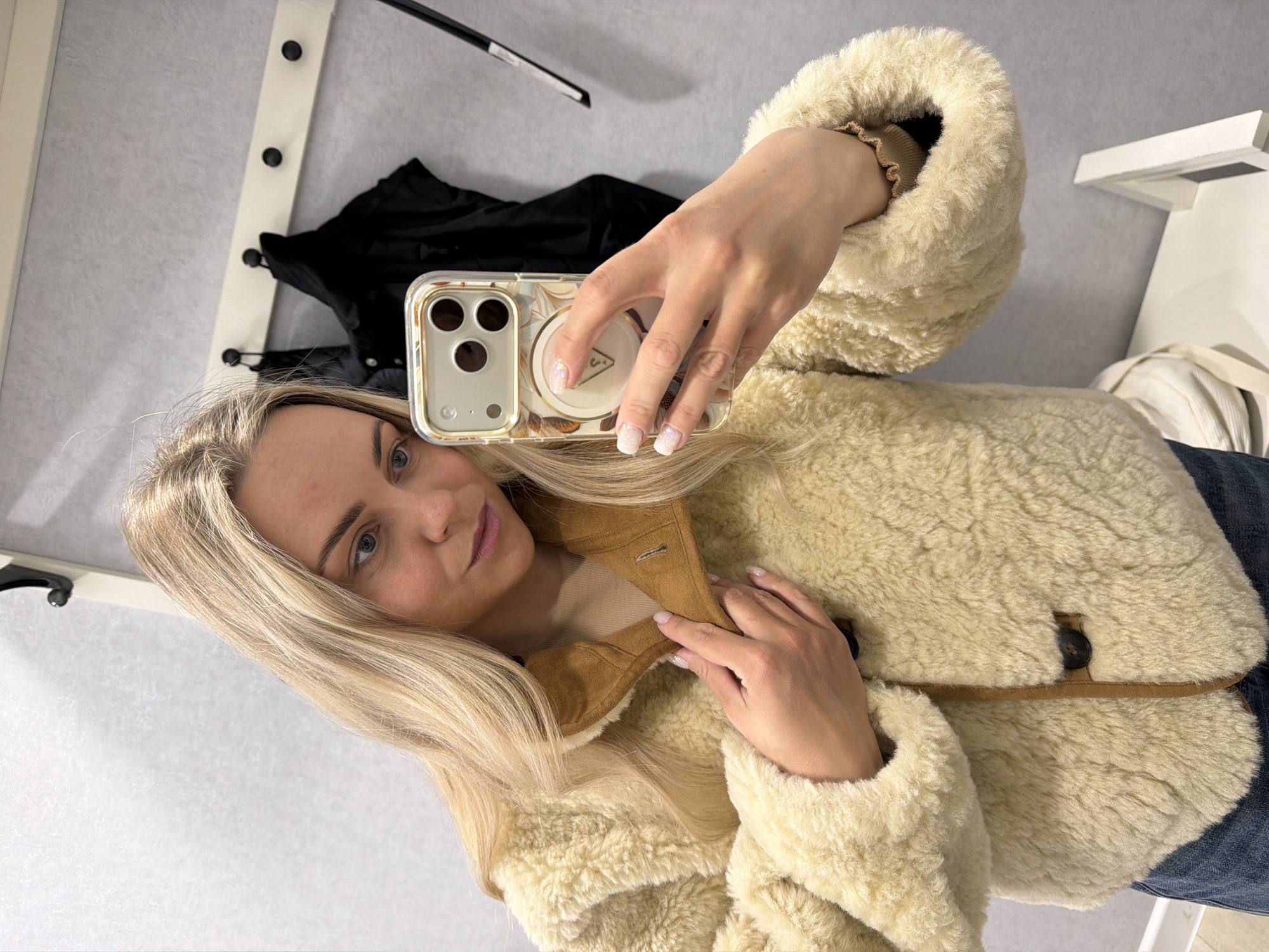Woman documents breakfast outing with selfies and food photos