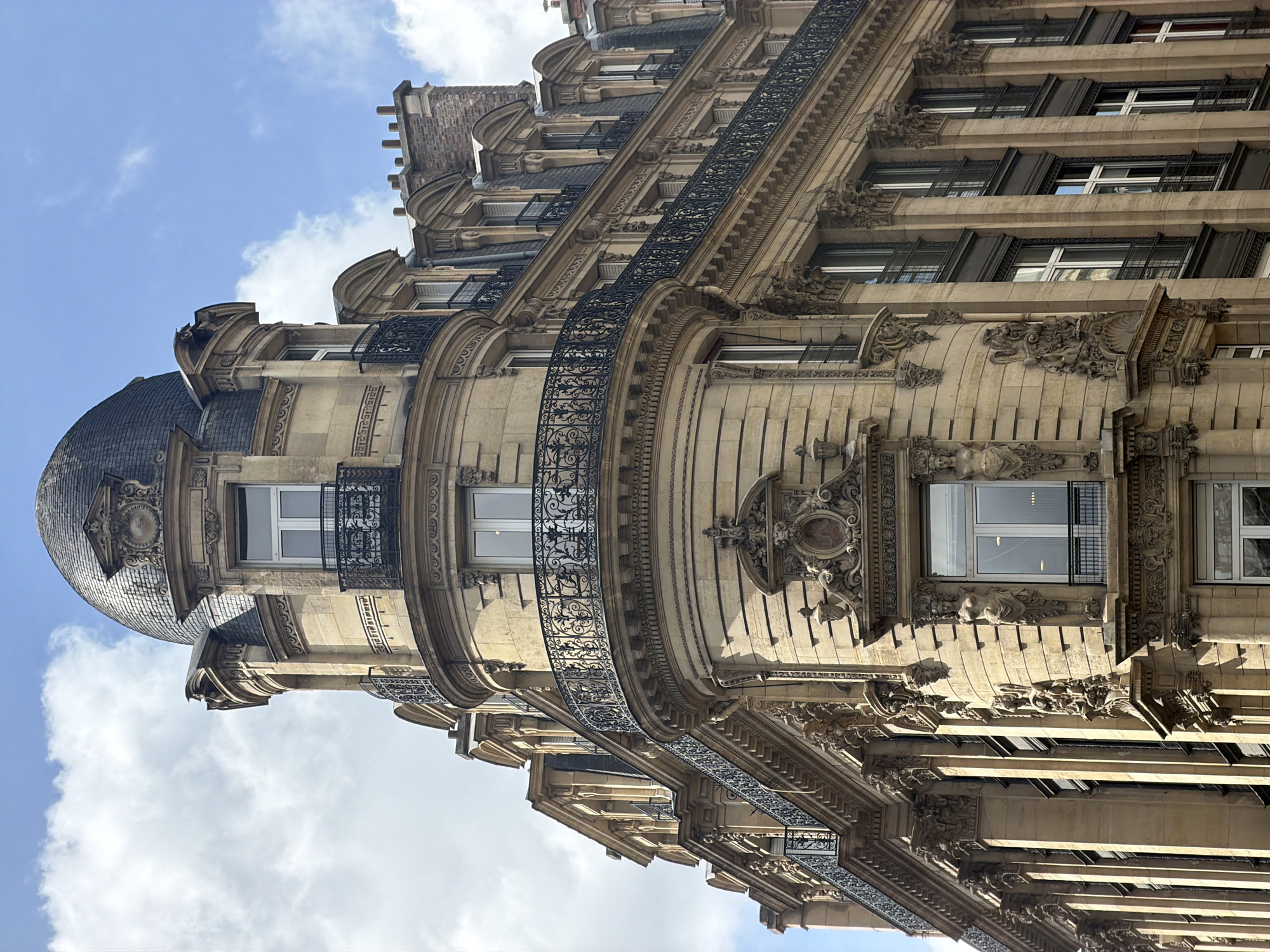Routine street scenes documented across central Paris during midday
