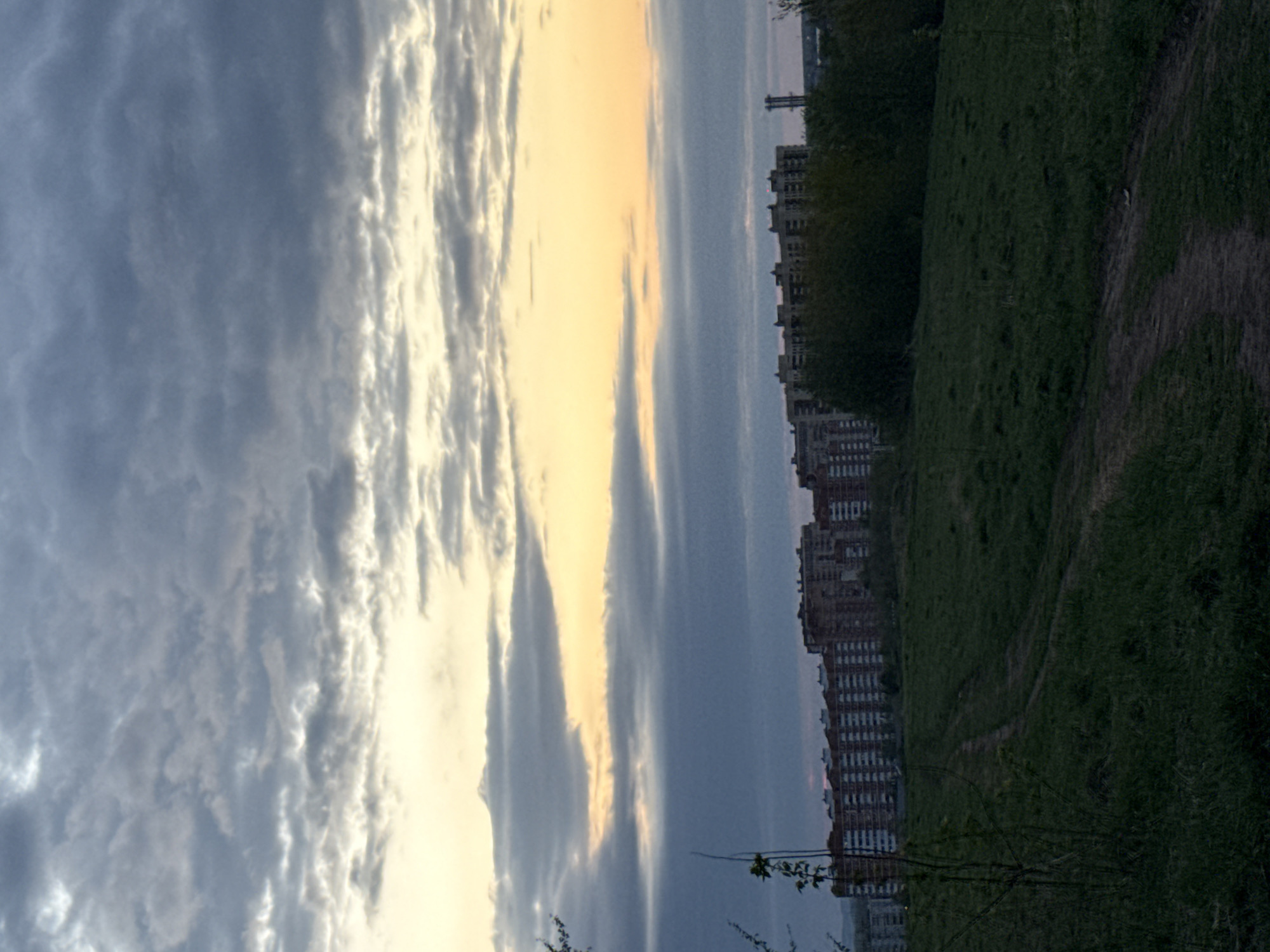 Golden light strip observed through clouds over Dmitrov field