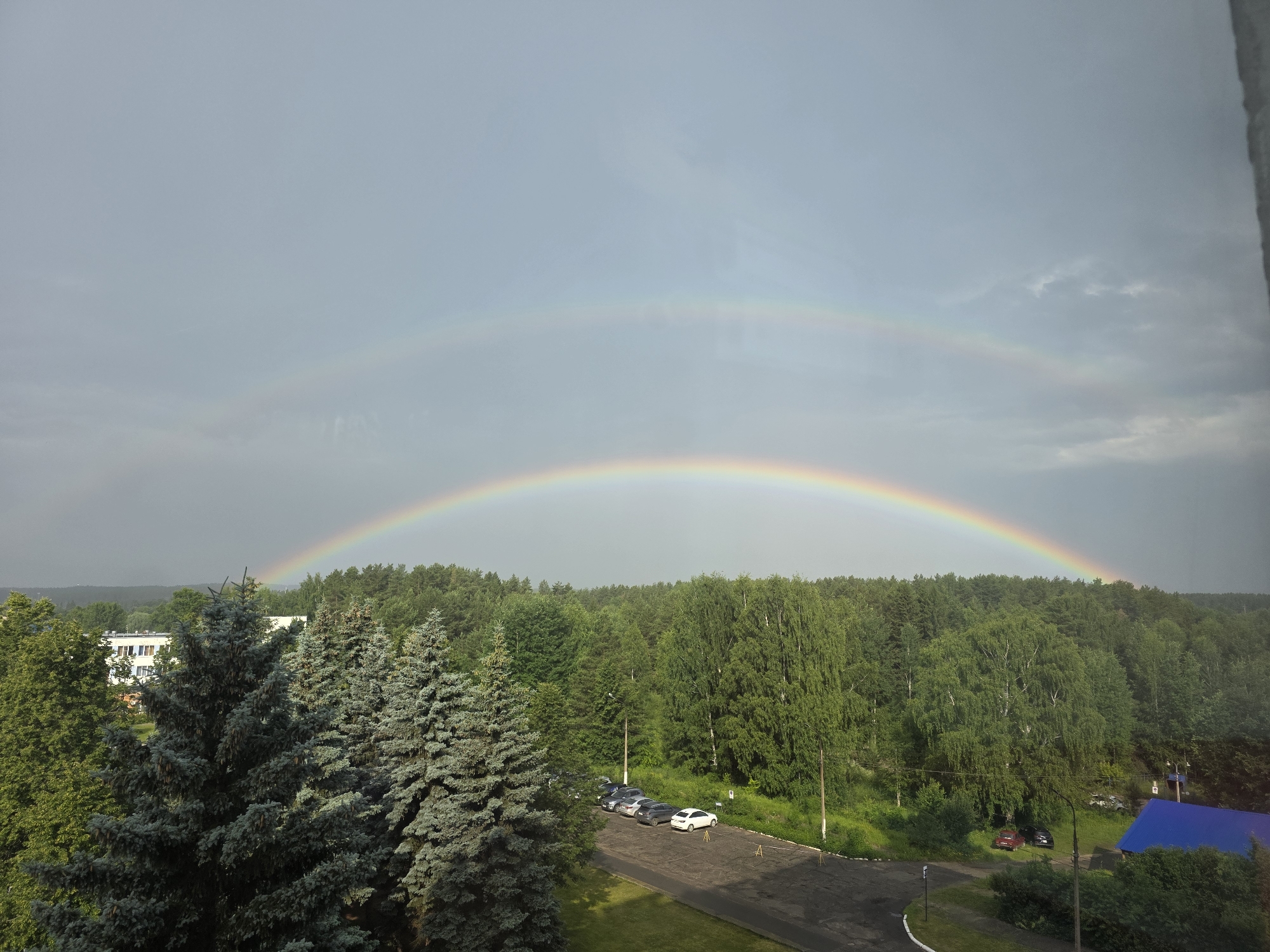 Double rainbows over Chaikovsky, paired with casual evening snapshots.