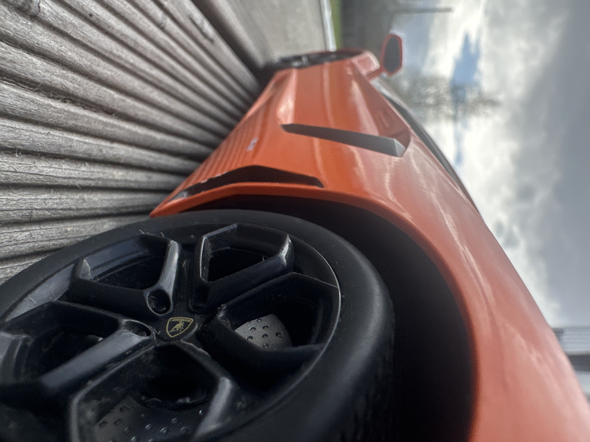 Person photographs toy Lamborghini, takes sky selfies in Krasnoyarsk