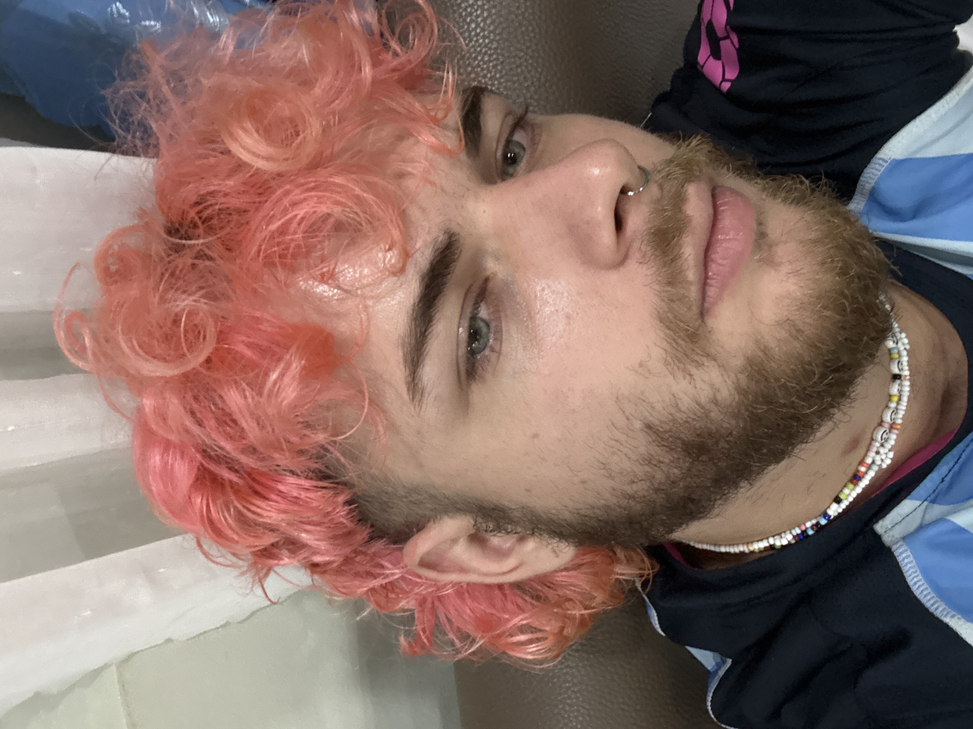 Pink-haired man photographed in Đà Nẵng indoor portrait session