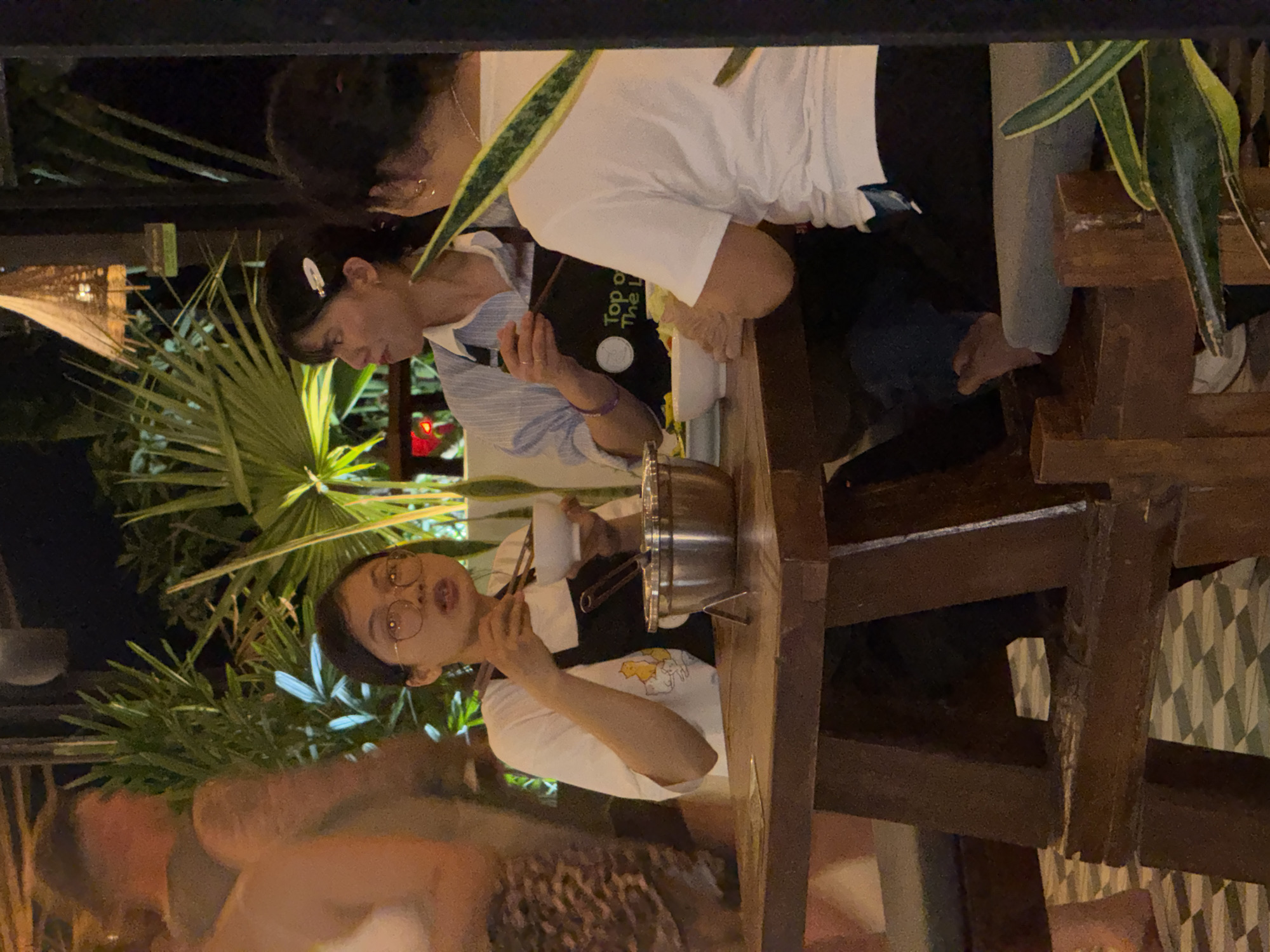 Restaurant dining and kitchen operations documented in Hà Giang Ward
