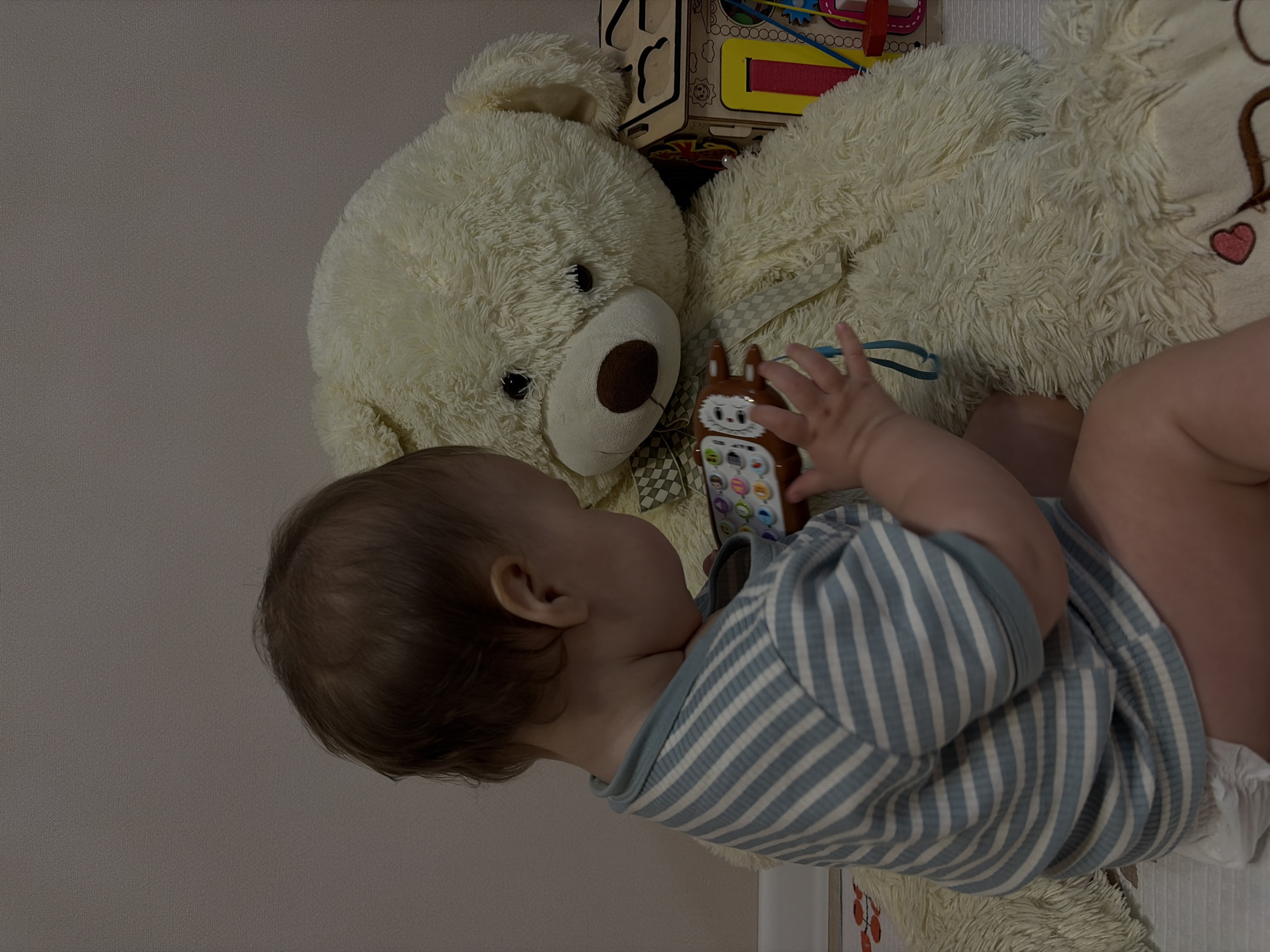 Baby playtime with toys and caregiver documented over 12-minute span