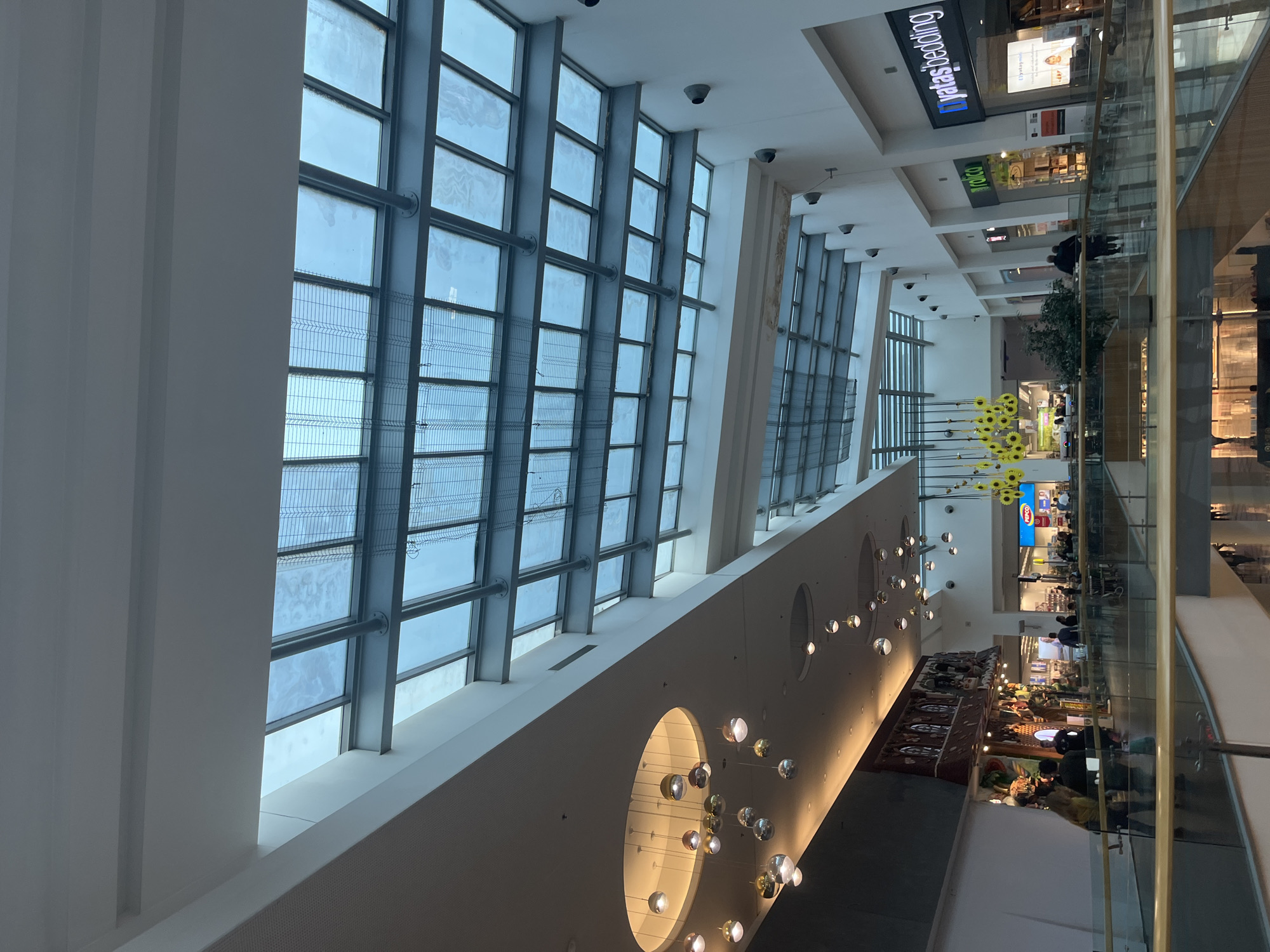 Porsche 911 displayed in modern Varna shopping mall showroom