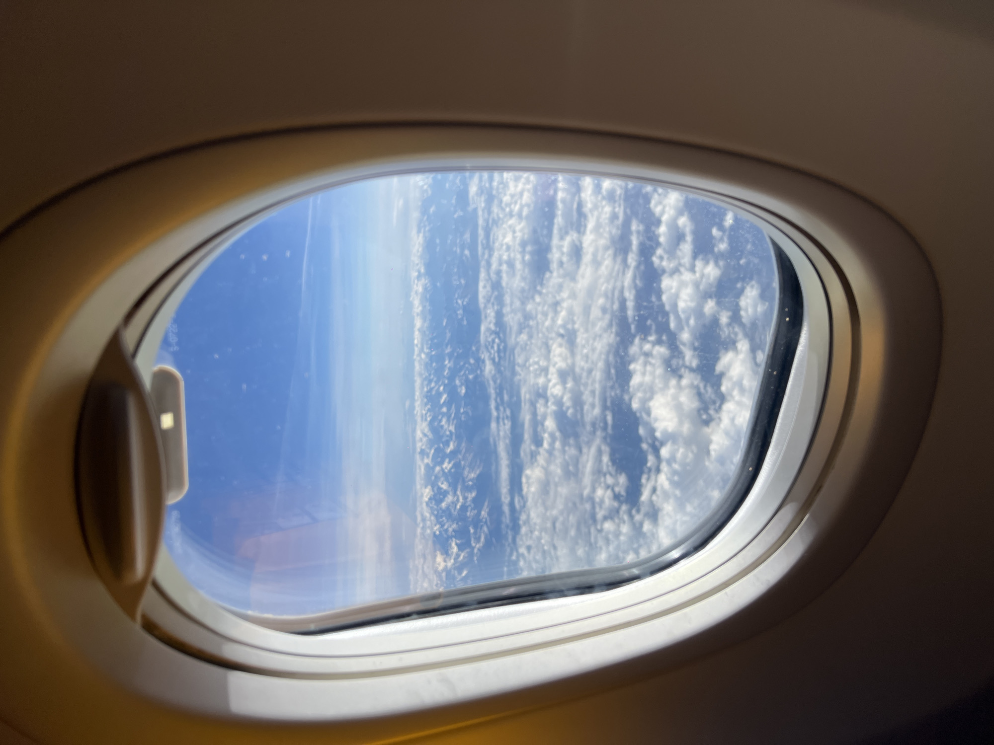 Passenger documents aerial views during morning flight over Erkheim