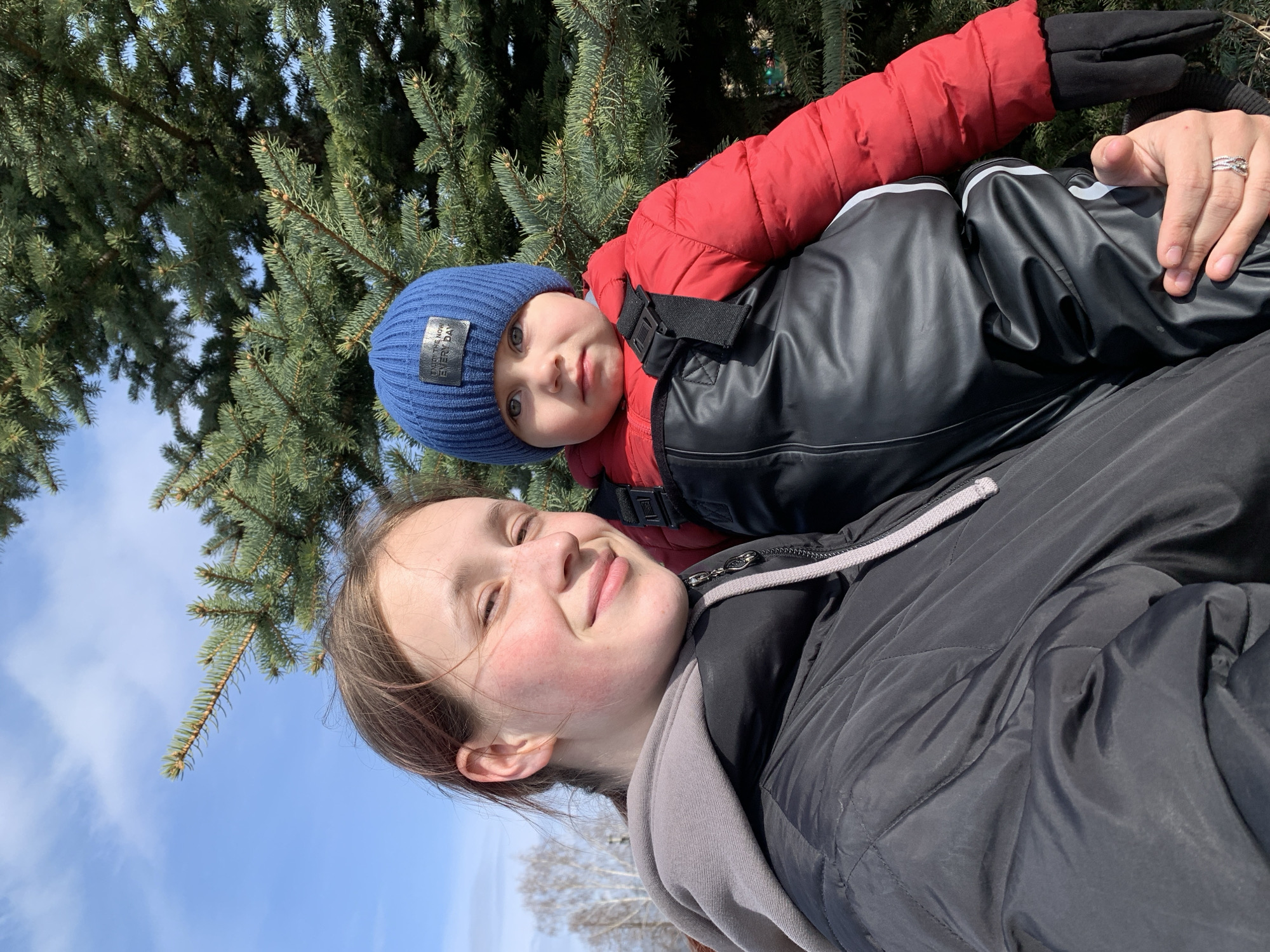 Mother and child enjoy playground time in Фоки, Russia