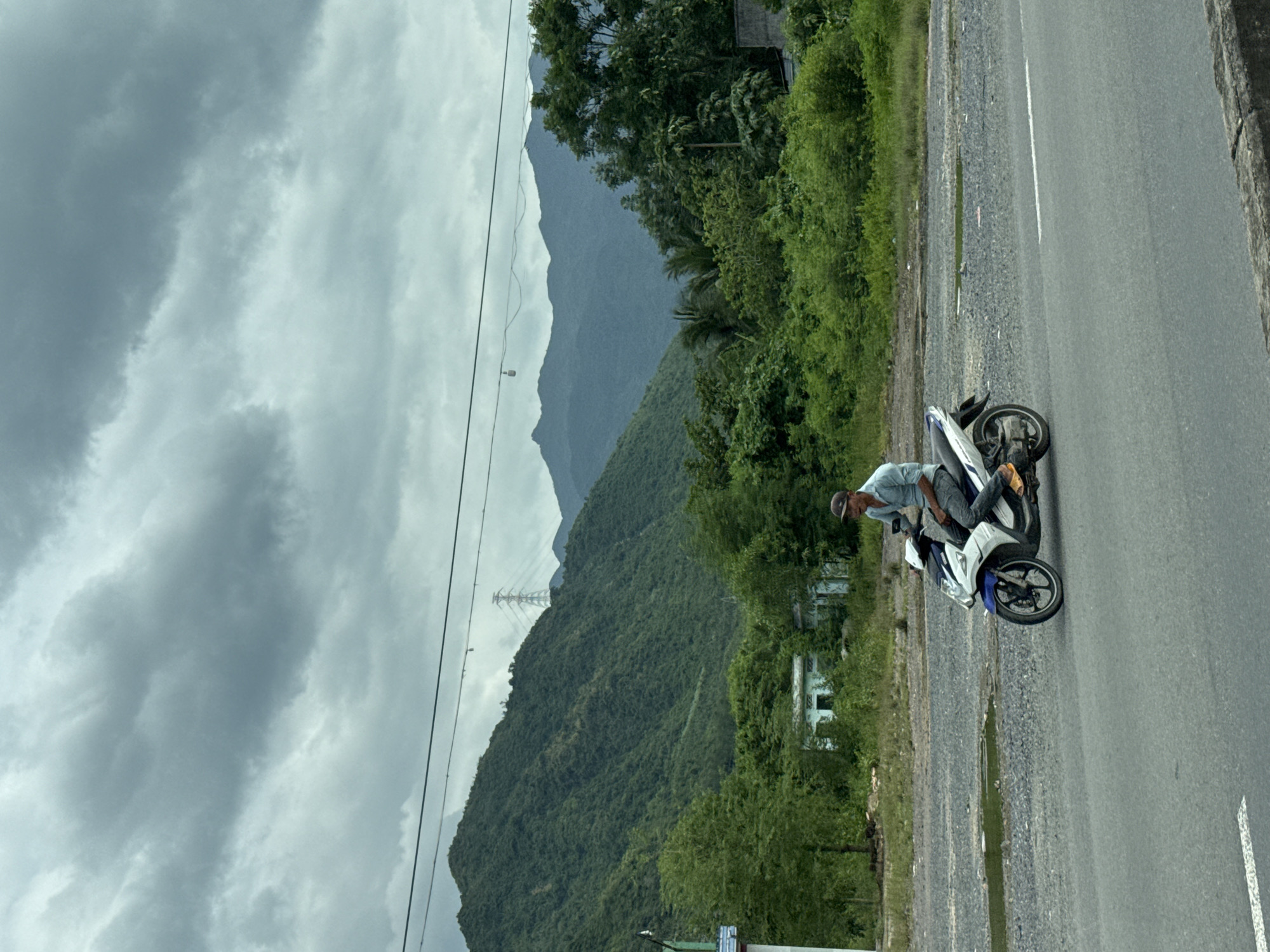 Scooter on a mountain road in Nam Ninh Hòa, Vietnam
