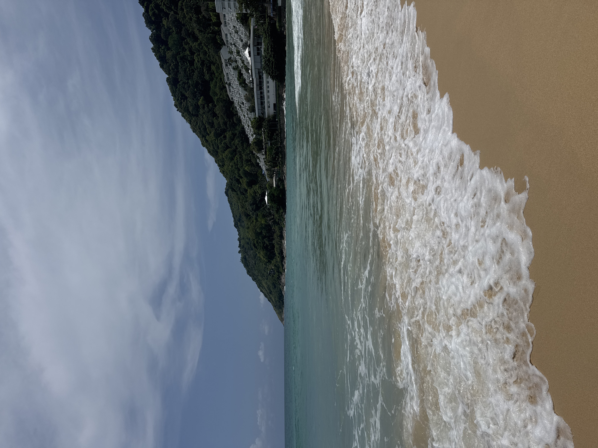 Sunny afternoon swimming and beach time at Rawai, Thailand