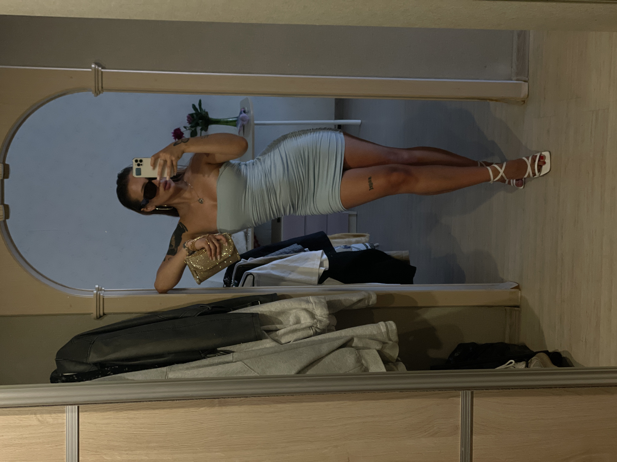 Mirror selfie in a Minsk hallway, June 2026