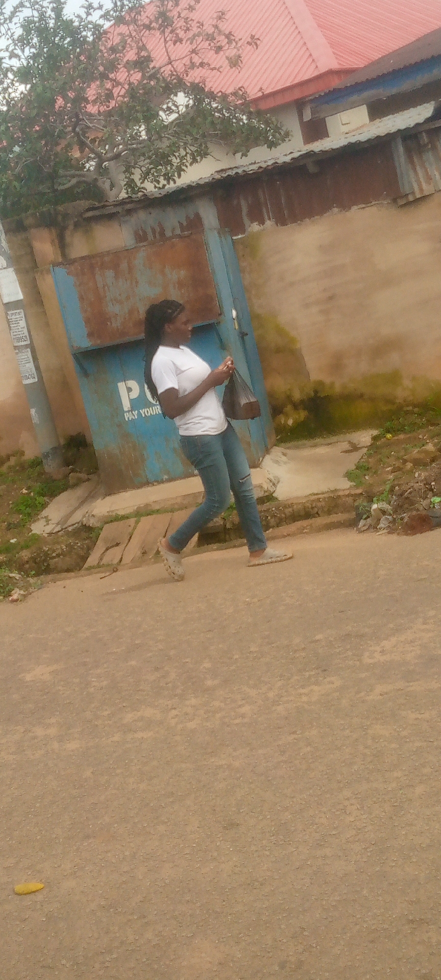 Everyday street life in a busy urban African neighborhood
