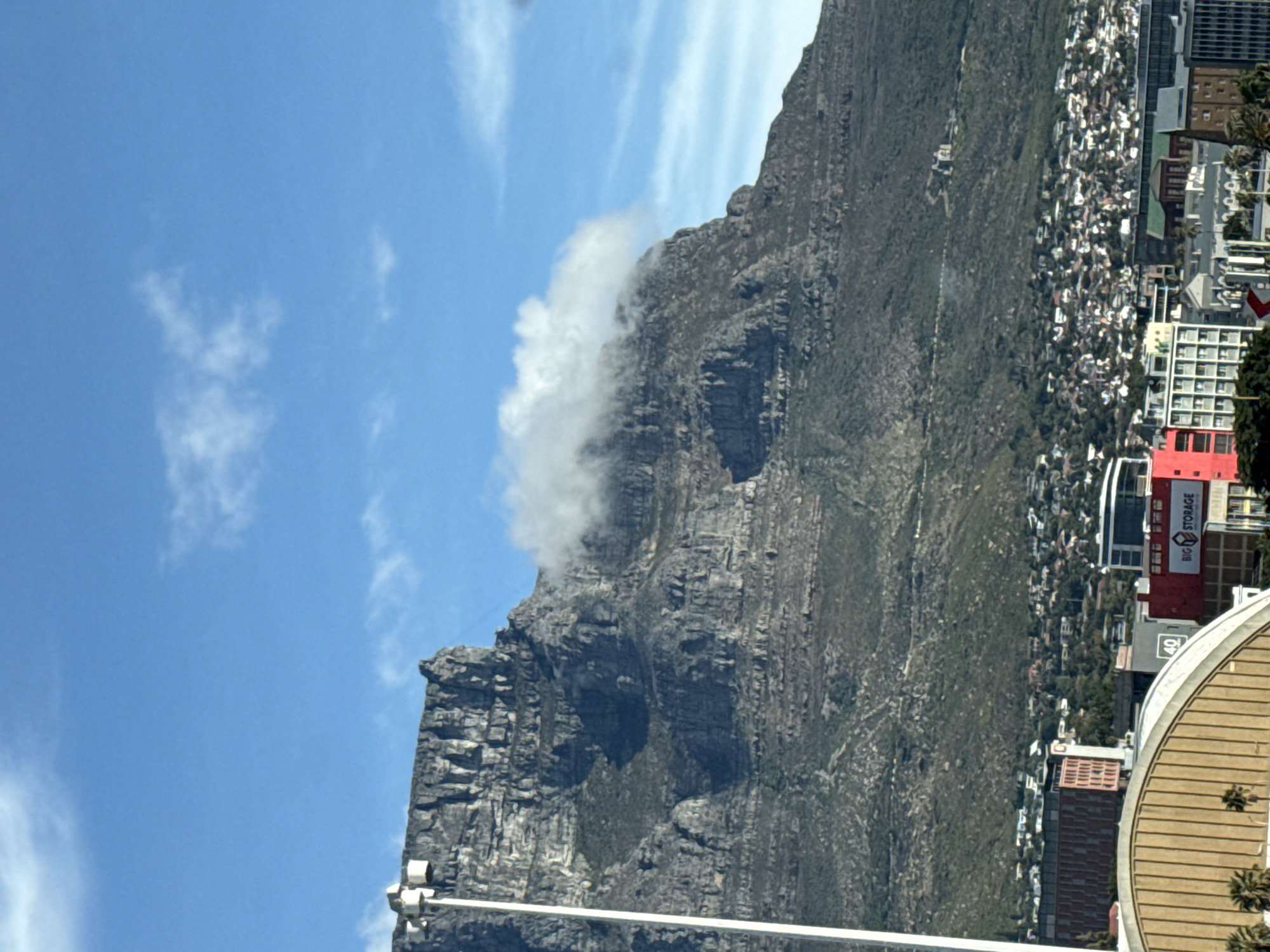 Table Mountain partially shrouded in clouds over Cape Town