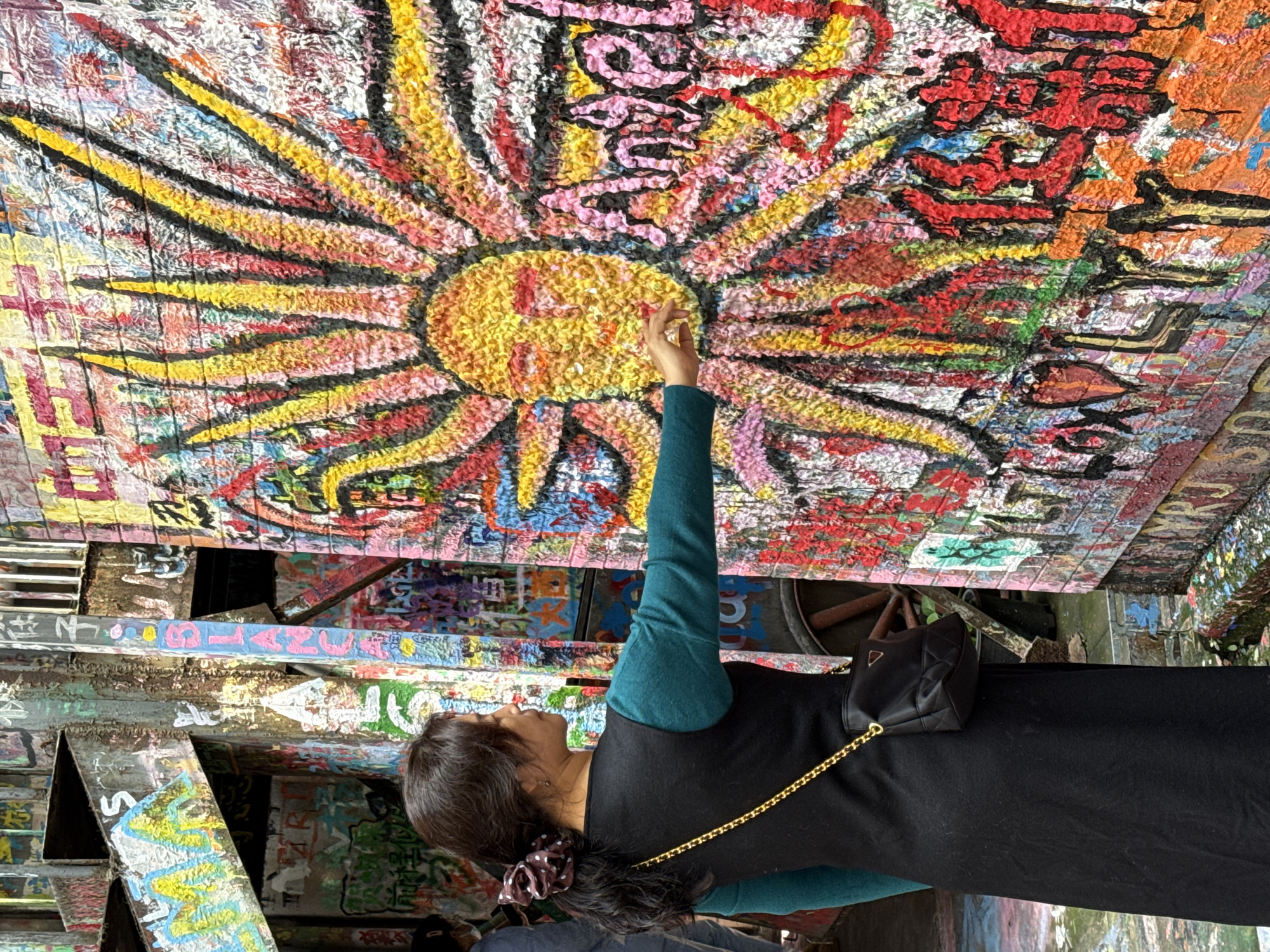Street art viewing and pedestrian activity in Jiulongpo District