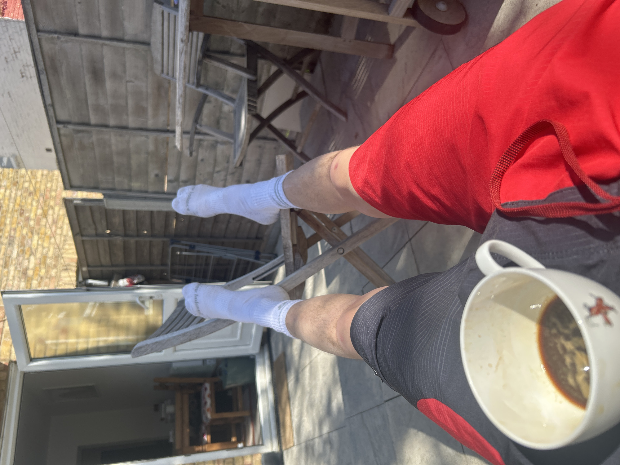 Person spotted in mismatched red and black shorts in London