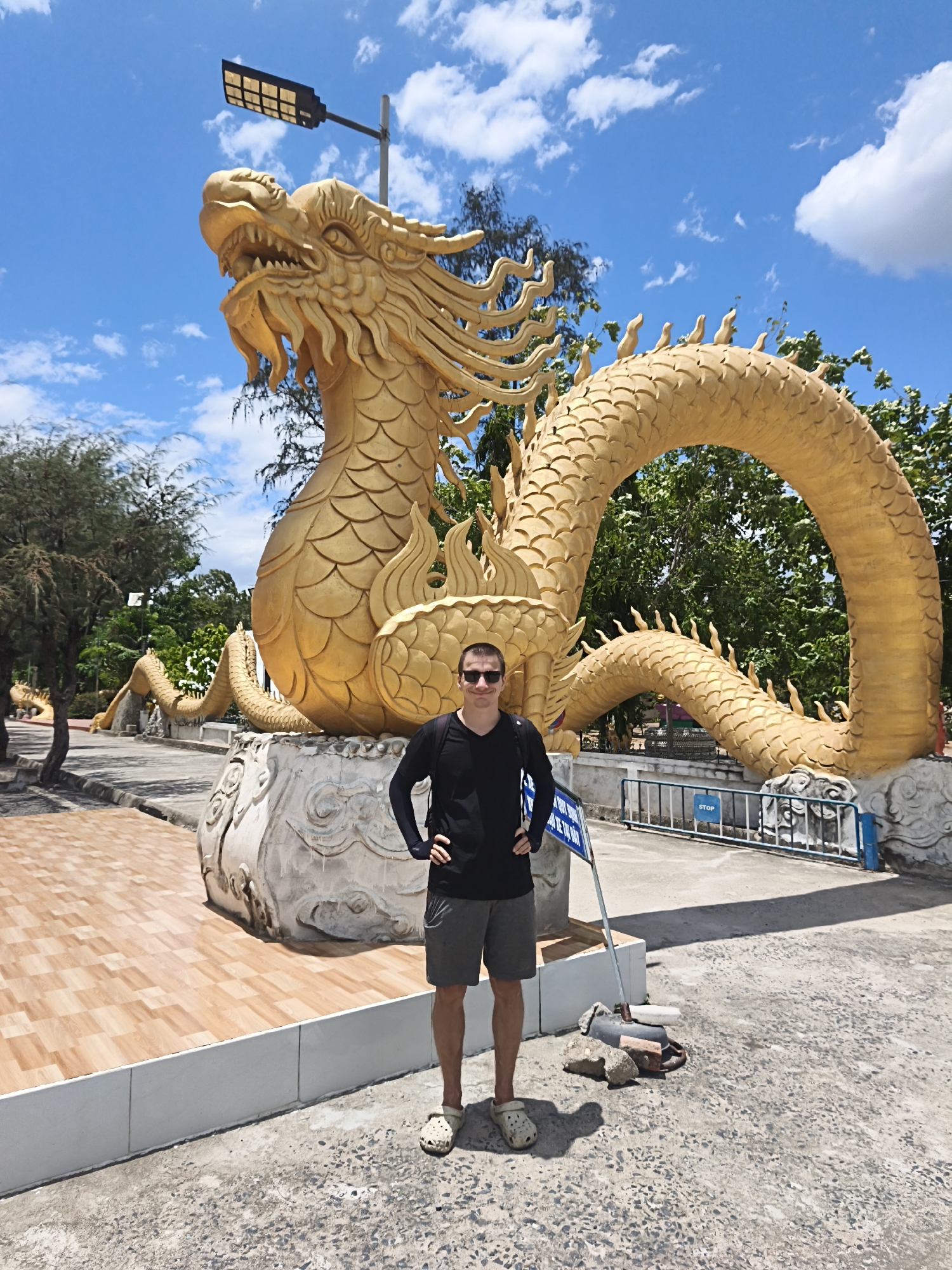 Exploring ornate Buddhist temple grounds in Cam Ranh, Vietnam
