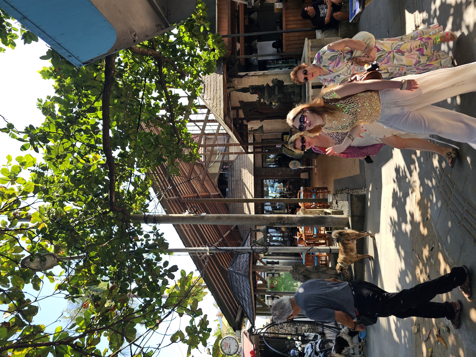 Sanur Beach morning: walkways, vendors, and a sea turtle statue