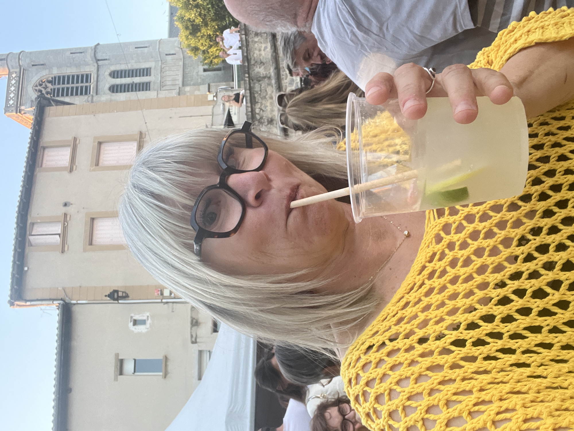 Evening social gathering captured in Saint-Galmier outdoor dining scene