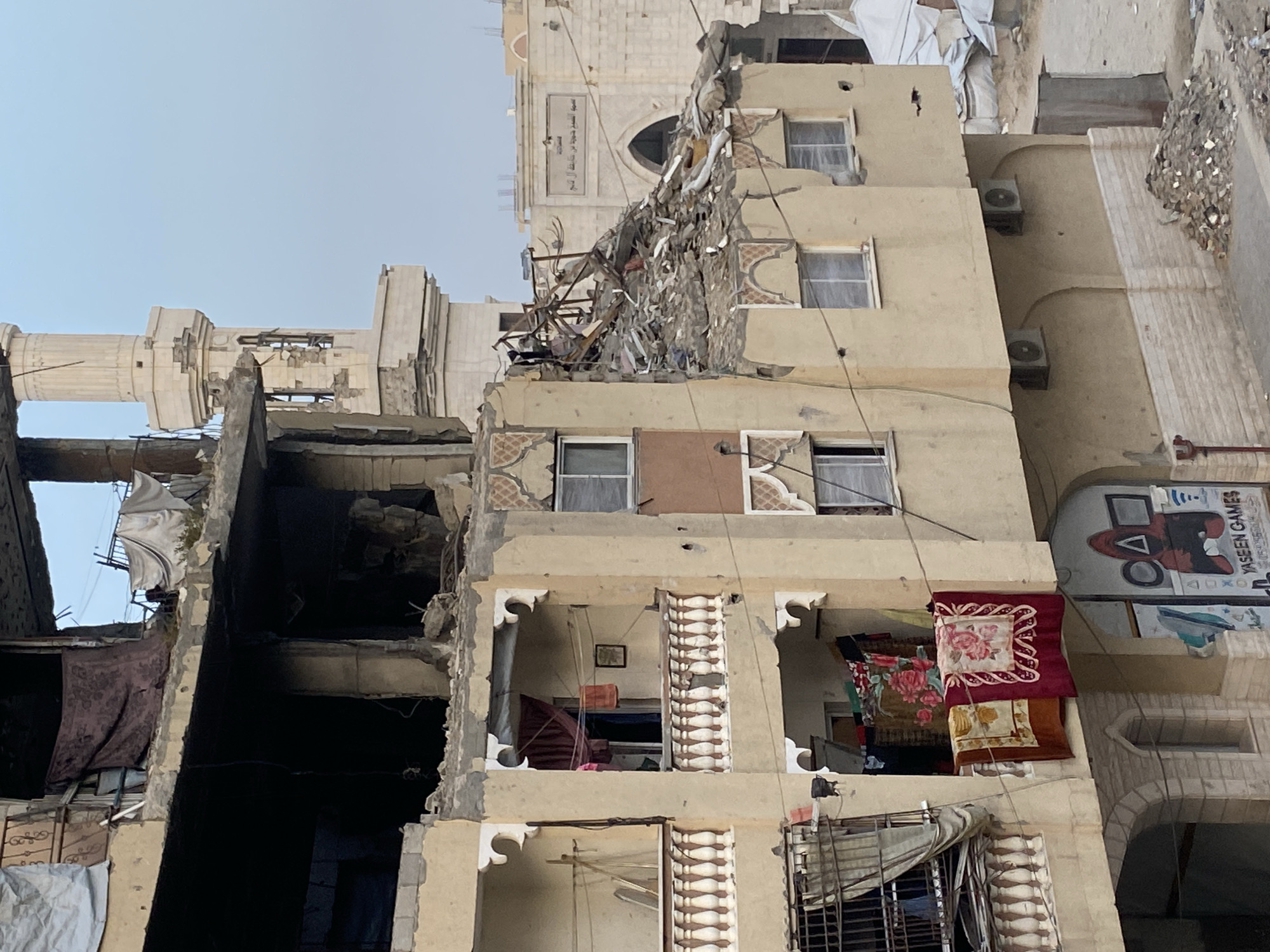 Salvage operations documented in Khan Yunis debris site