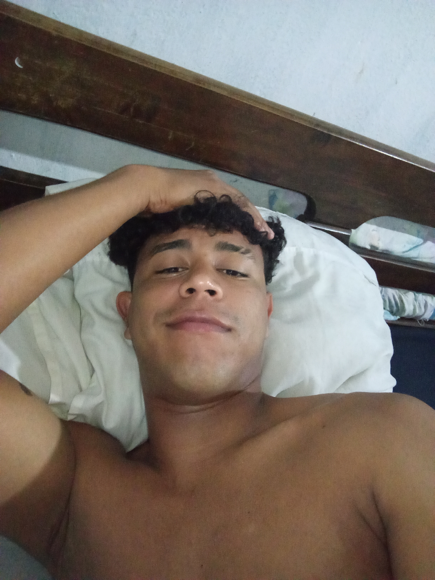 Young man photographed resting in Macho Muerto, Venezuela