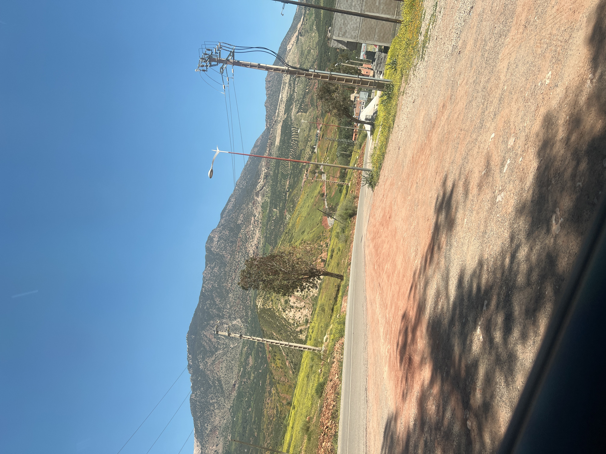 Morning drive documented through rural Ouaouizert, Morocco