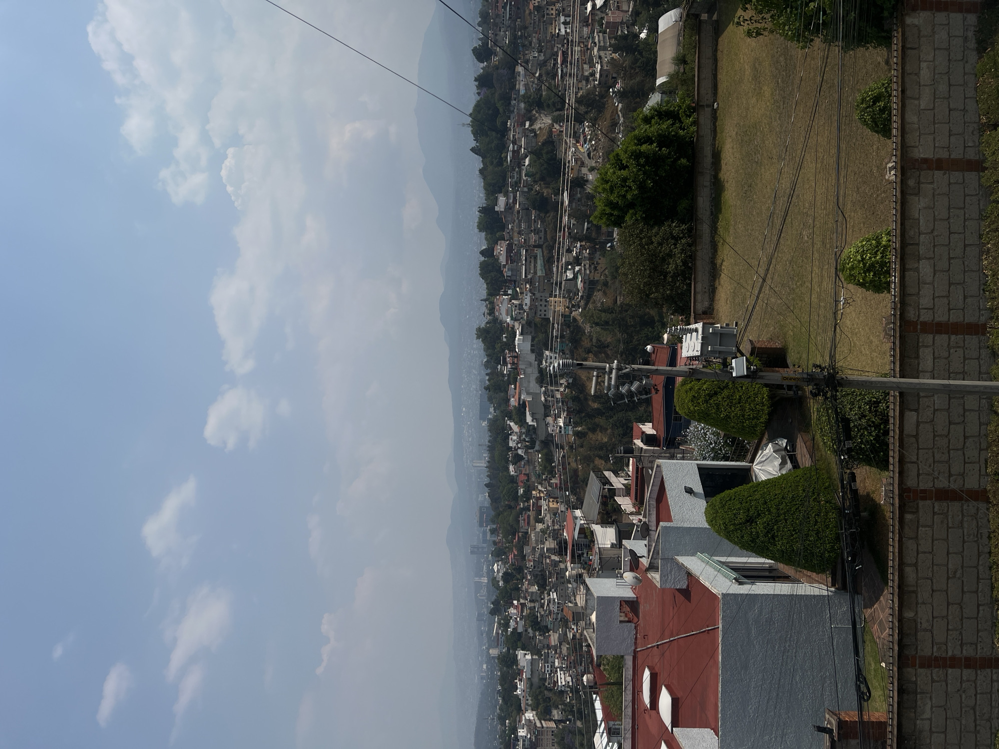 Evening cityscape view captures Mexico City's sprawling residential districts