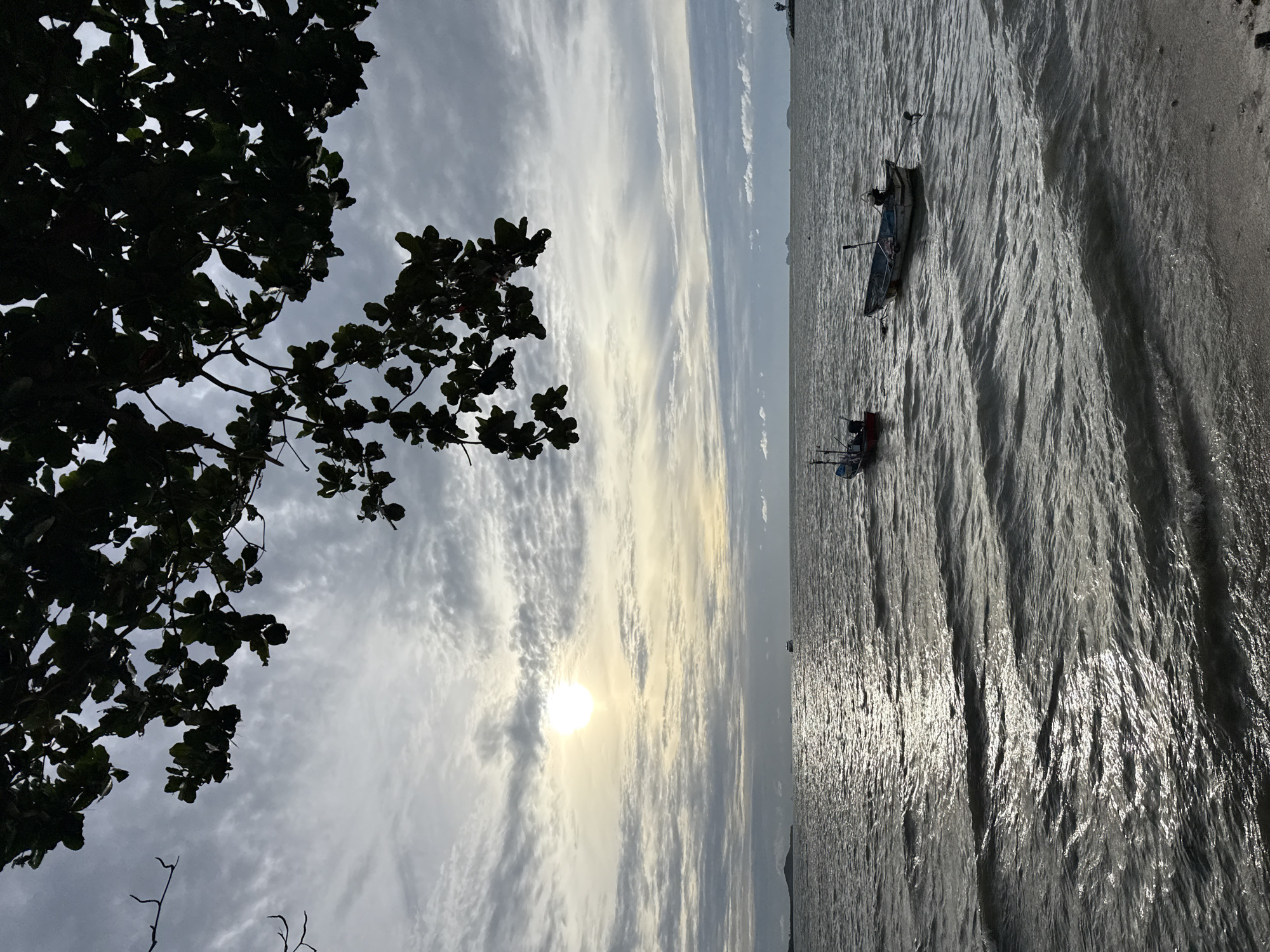 Overcast shoreline on Ko Samui, waves meeting the sand