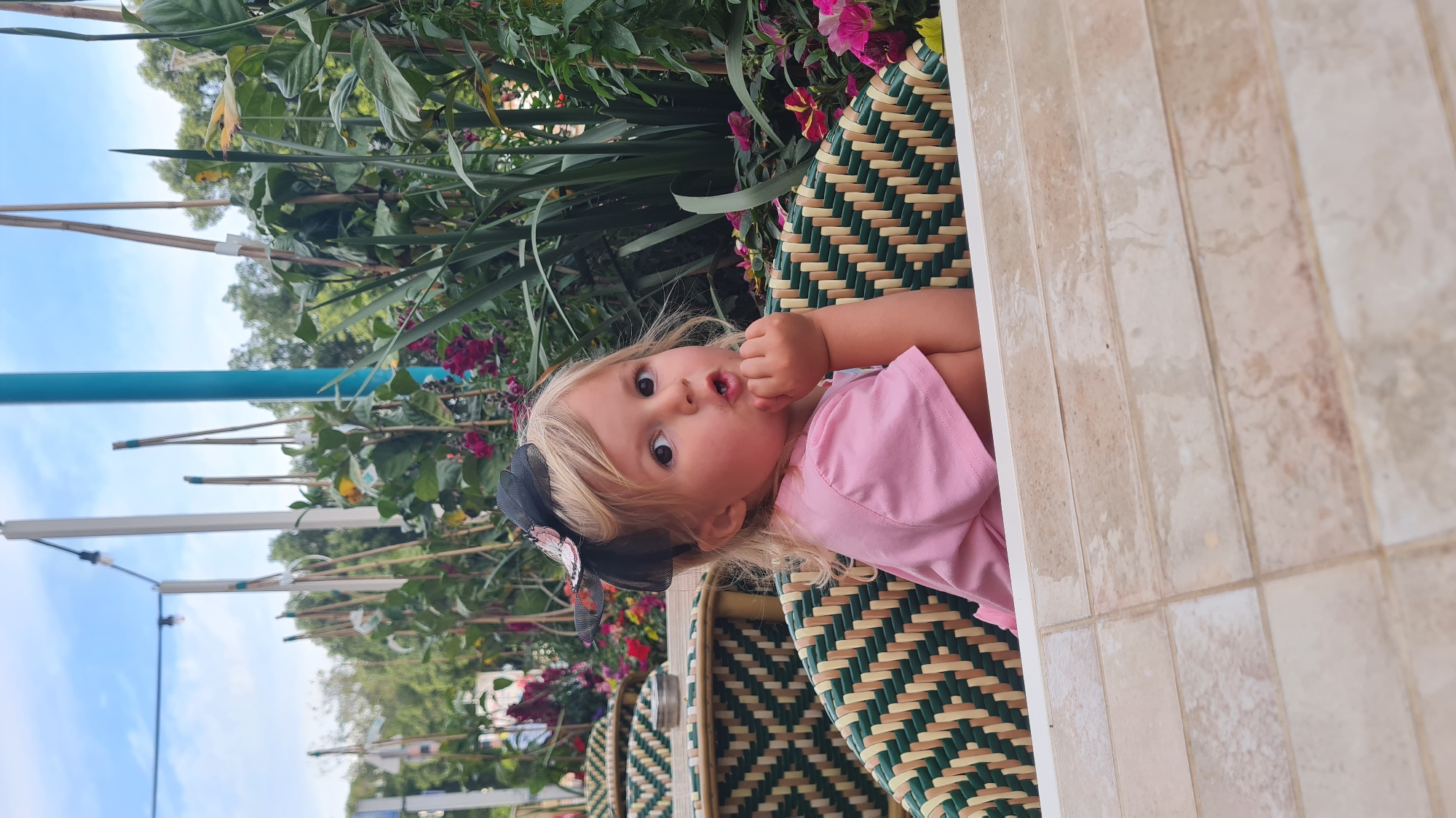 Young girl enjoys outdoor meal at Kiryat Gat cafe