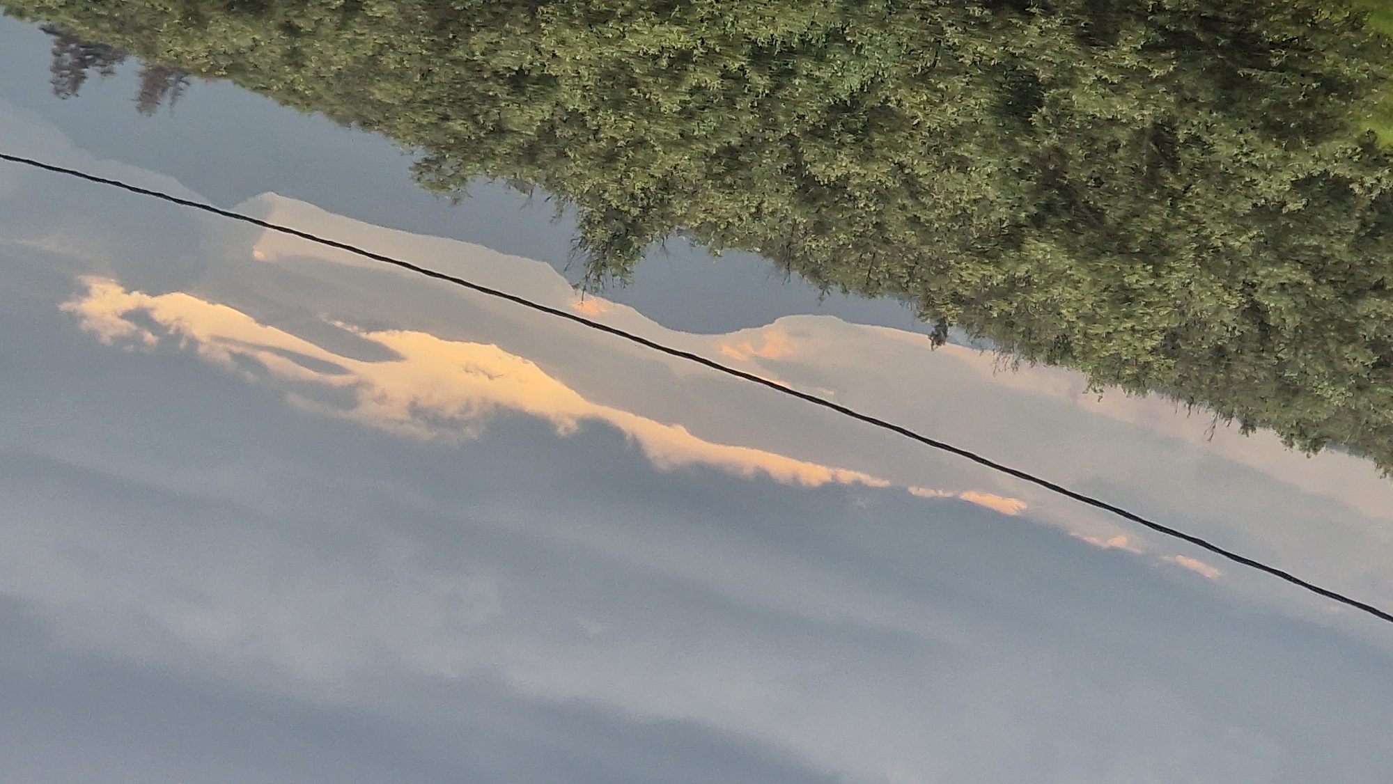 Orange-lit clouds observed above power line in Ain Chkef