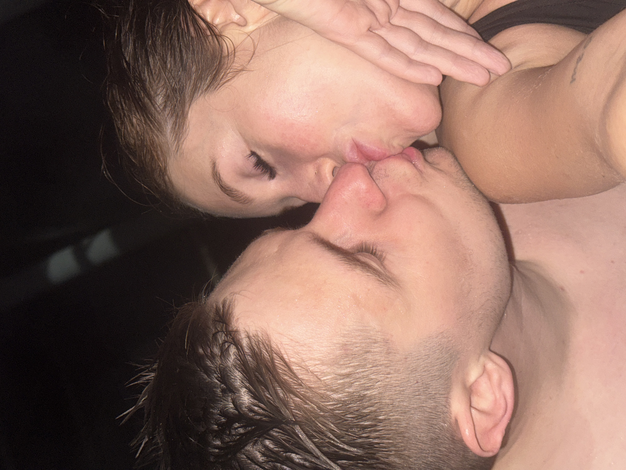 Three people enjoy intimate moments in Abkhazia thermal springs