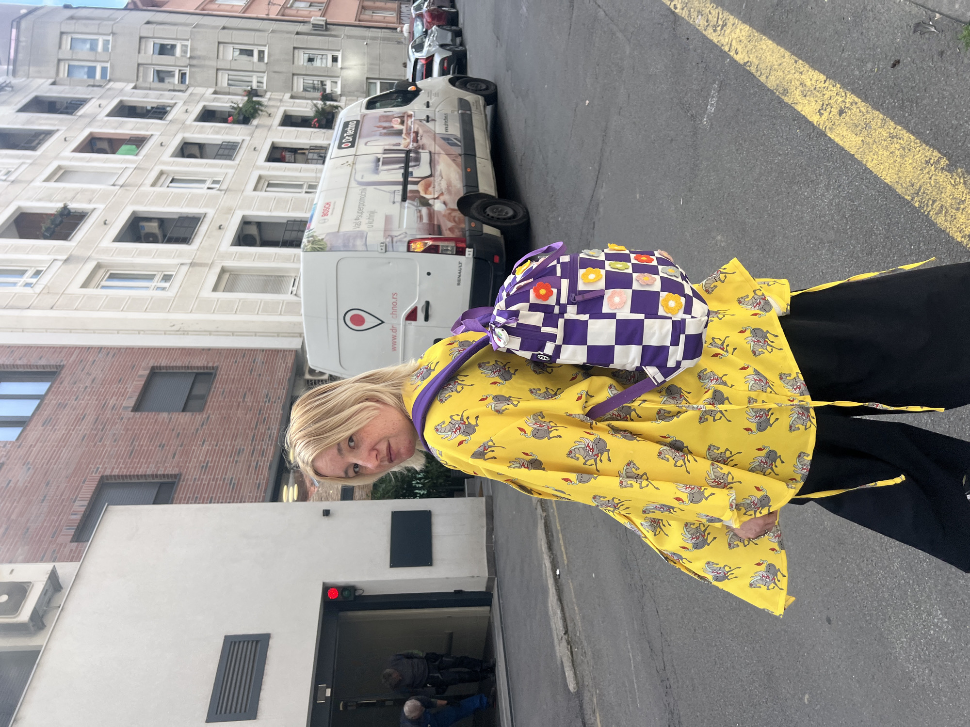 Woman in horse-patterned jacket spotted on Vracar sidewalk