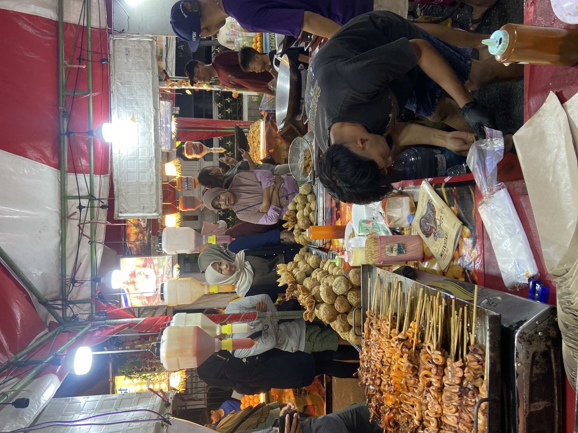 Night market in Kecamatan Pati: grilled squid, open flames, street stalls