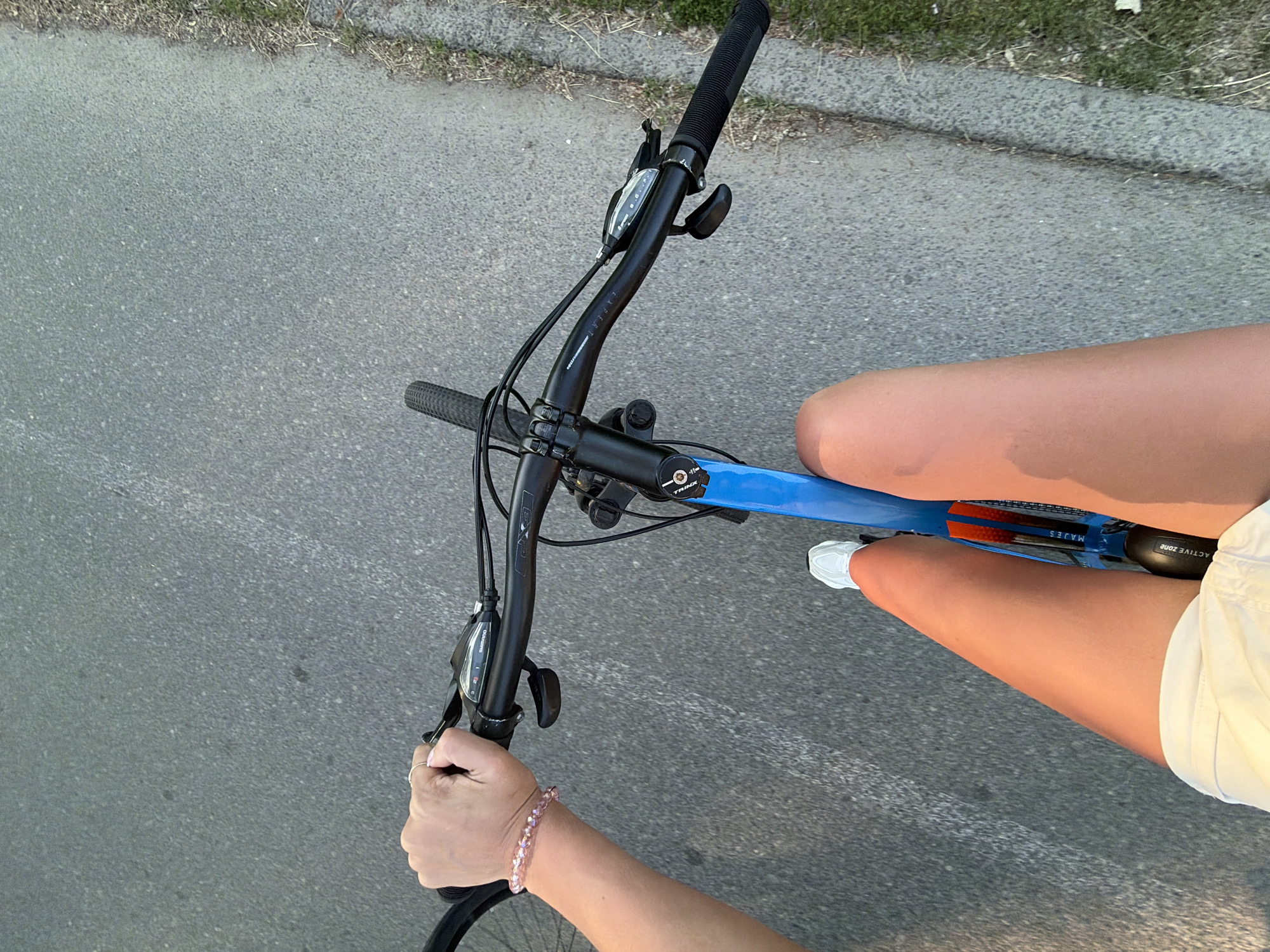 Cycling through Kyiv's riverside paths on a summer afternoon