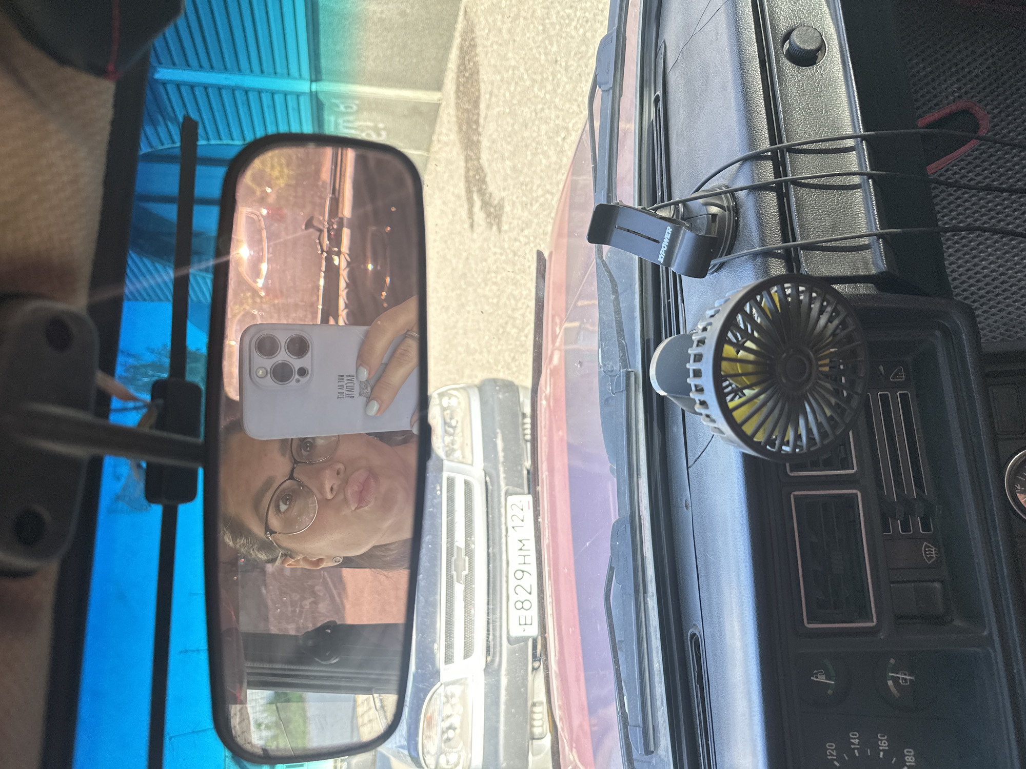 Woman documents ordinary day driving and shopping in Novoaltaysk