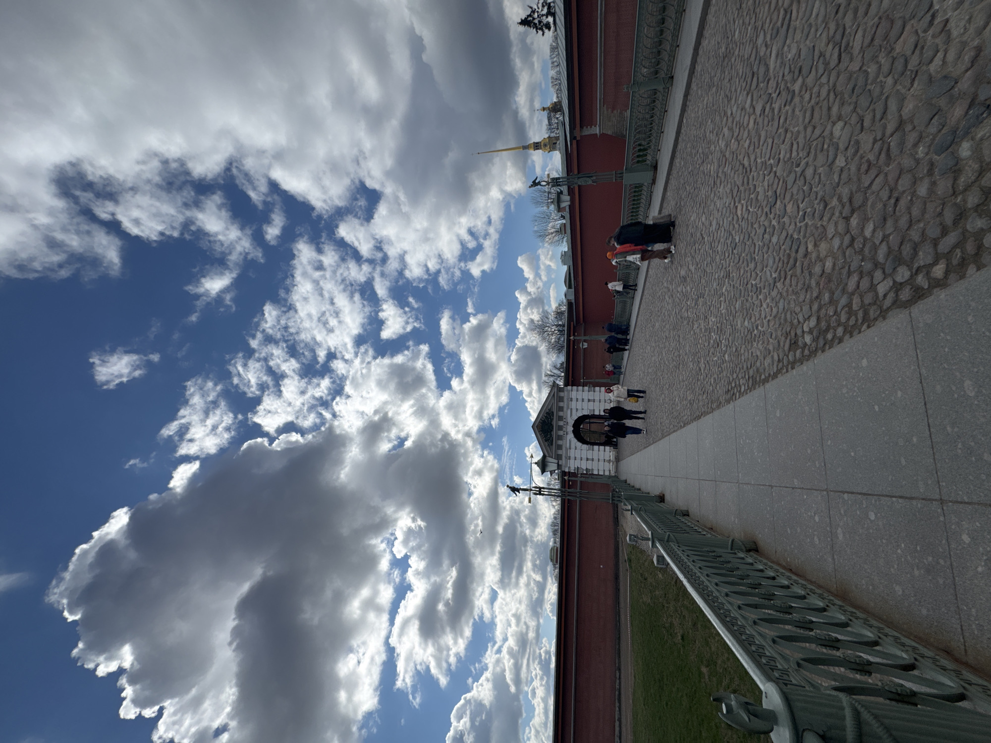 Tourist documents Saint Petersburg landmarks during morning walking tour