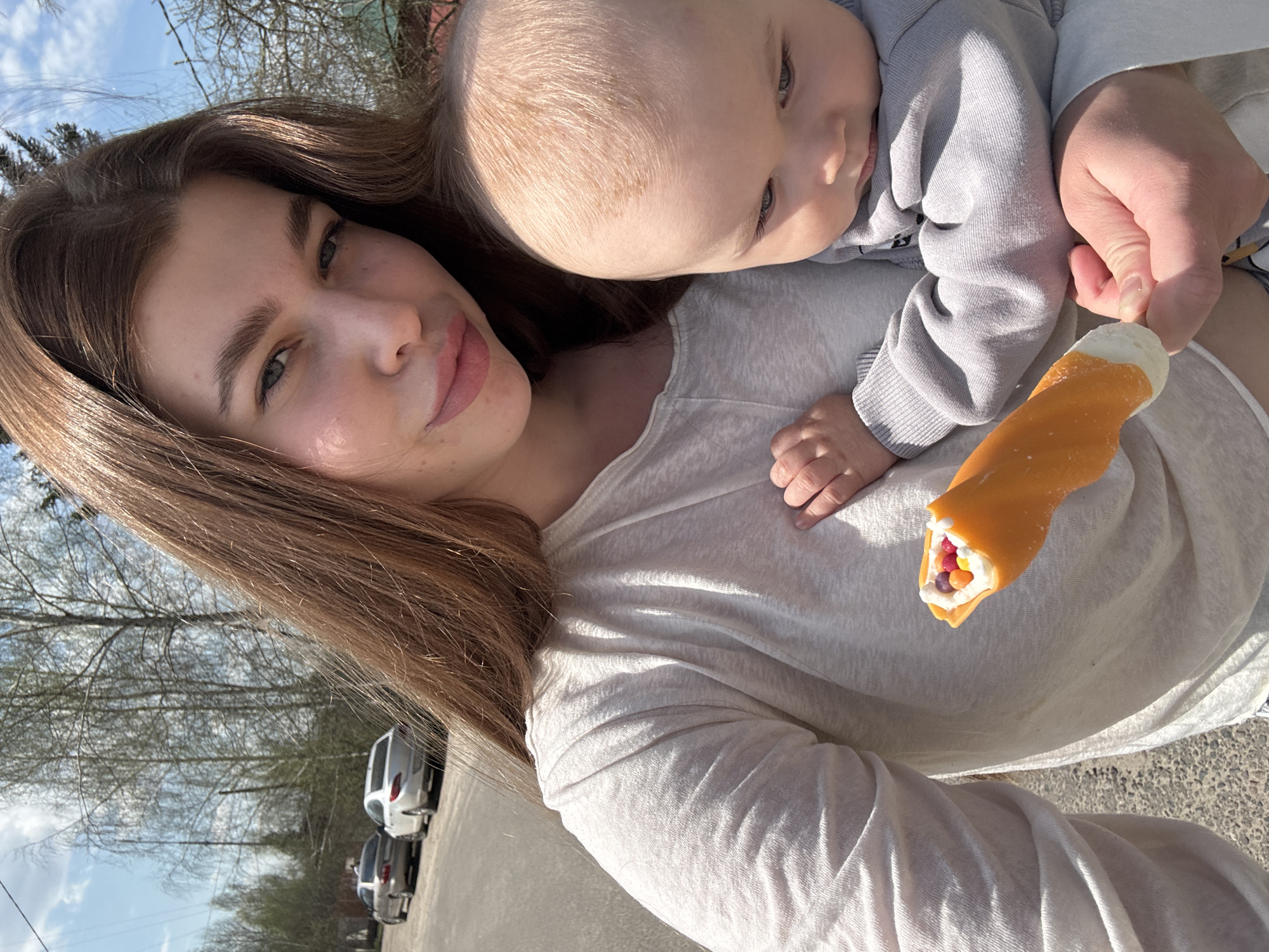Mother and child moment, candy treat captured in Шевлягино