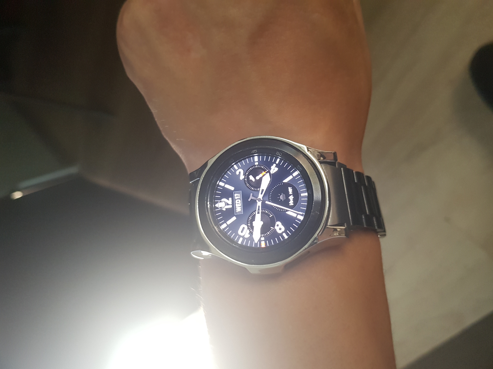 Two smartwatches on a wrist, Yerevan, June 17