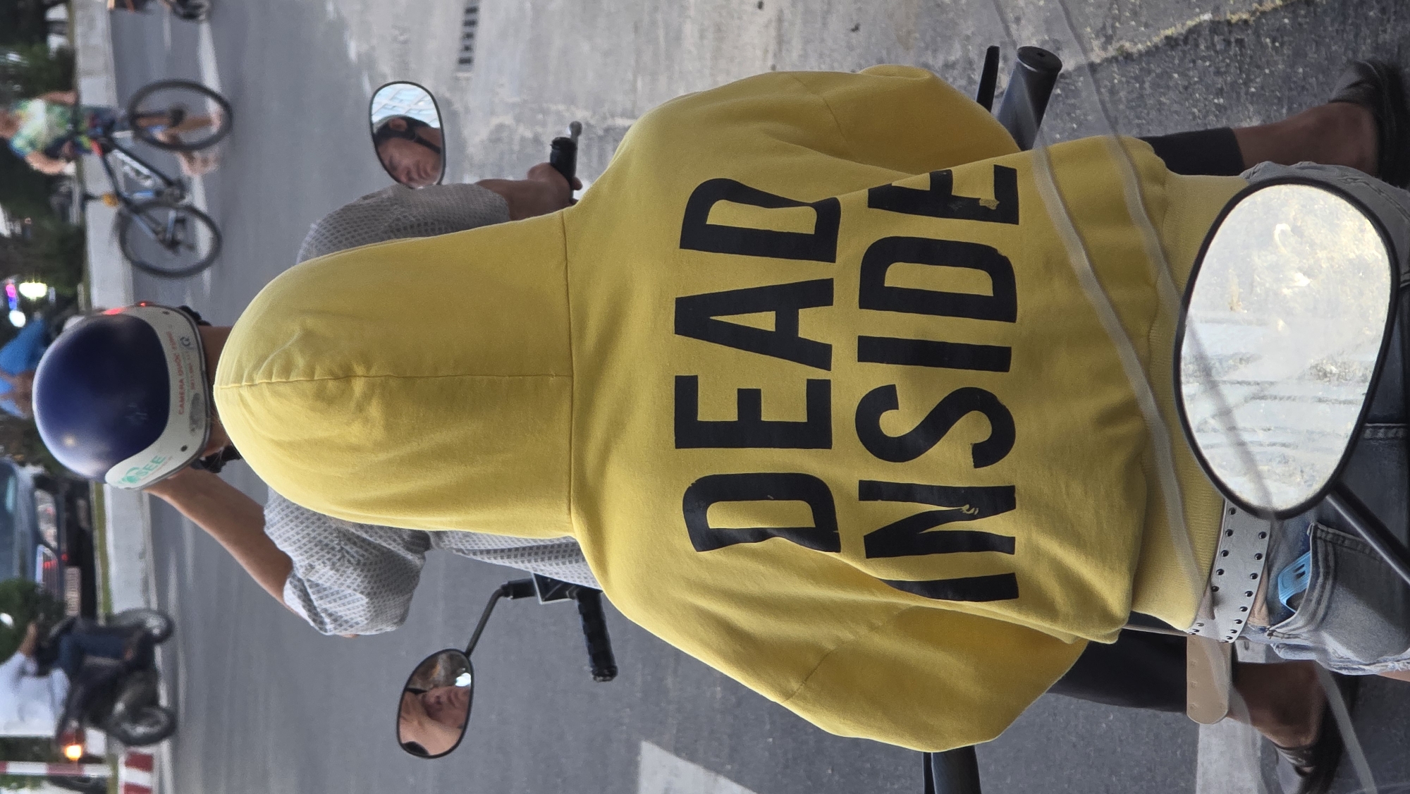 Scooter rider spotted wearing "DEAD INSIDE" hoodie in Vietnam
