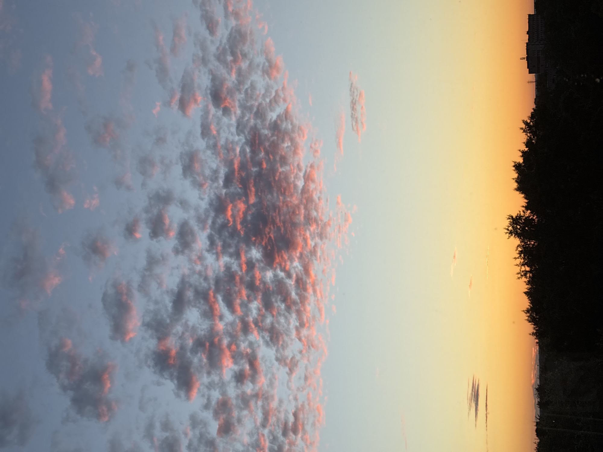 Sunset sky over a city, shot from multiple angles