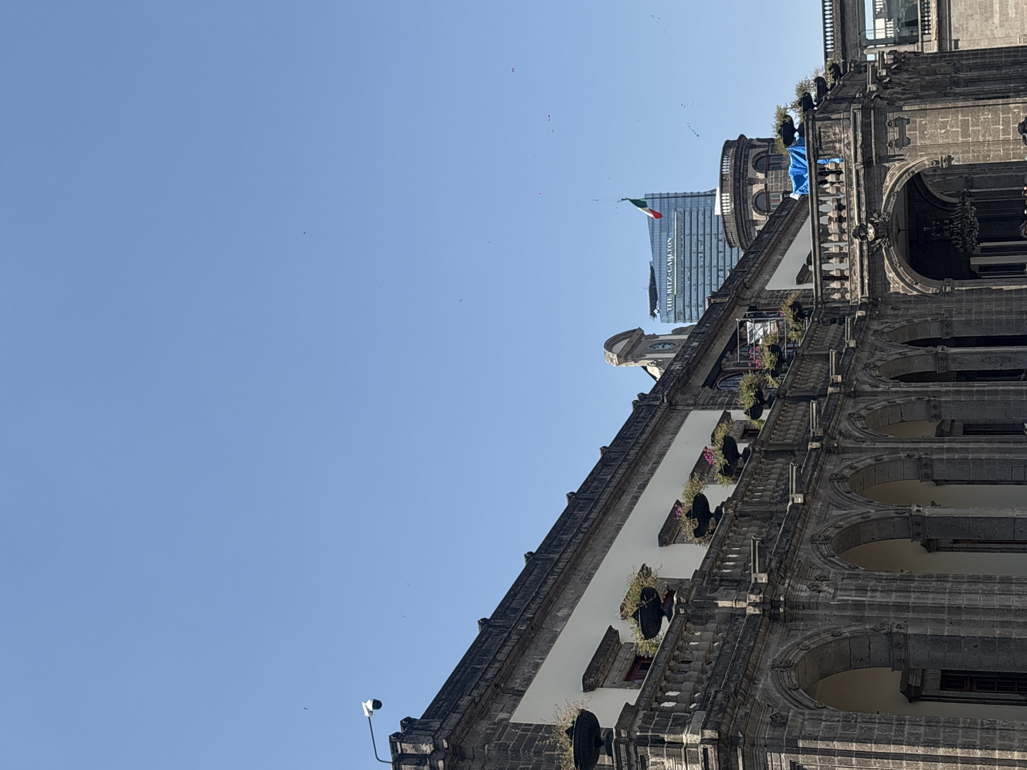 Daily life scenes captured across Mexico City under clear skies
