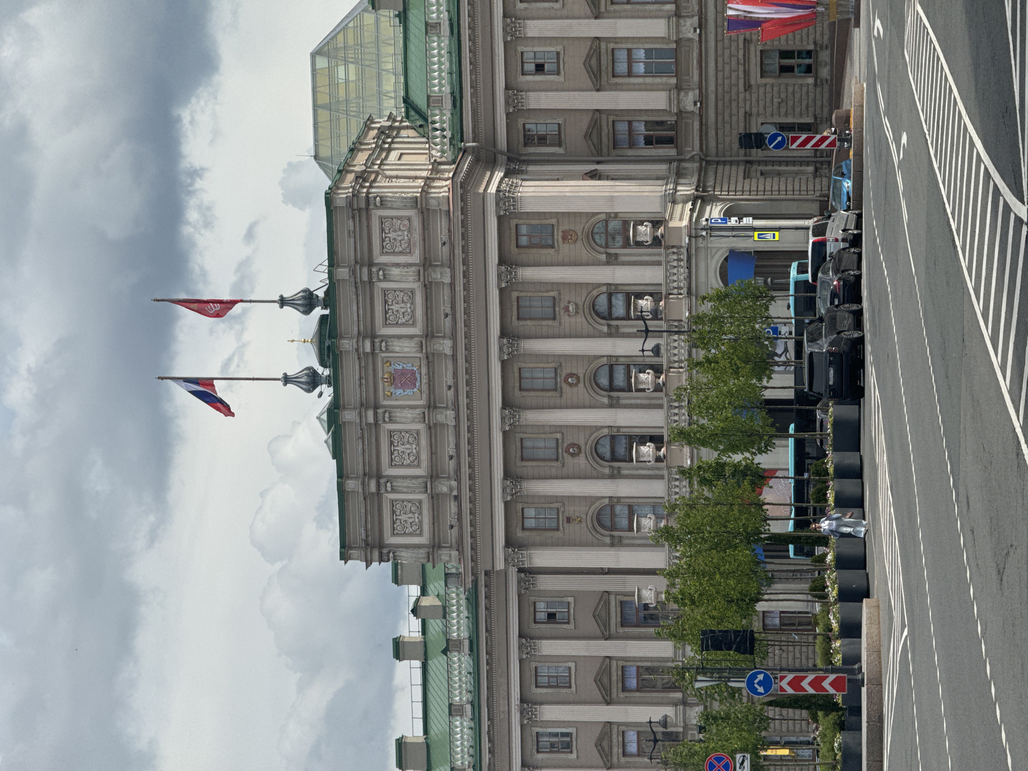 Tourist documents Saint Petersburg landmarks during morning walk