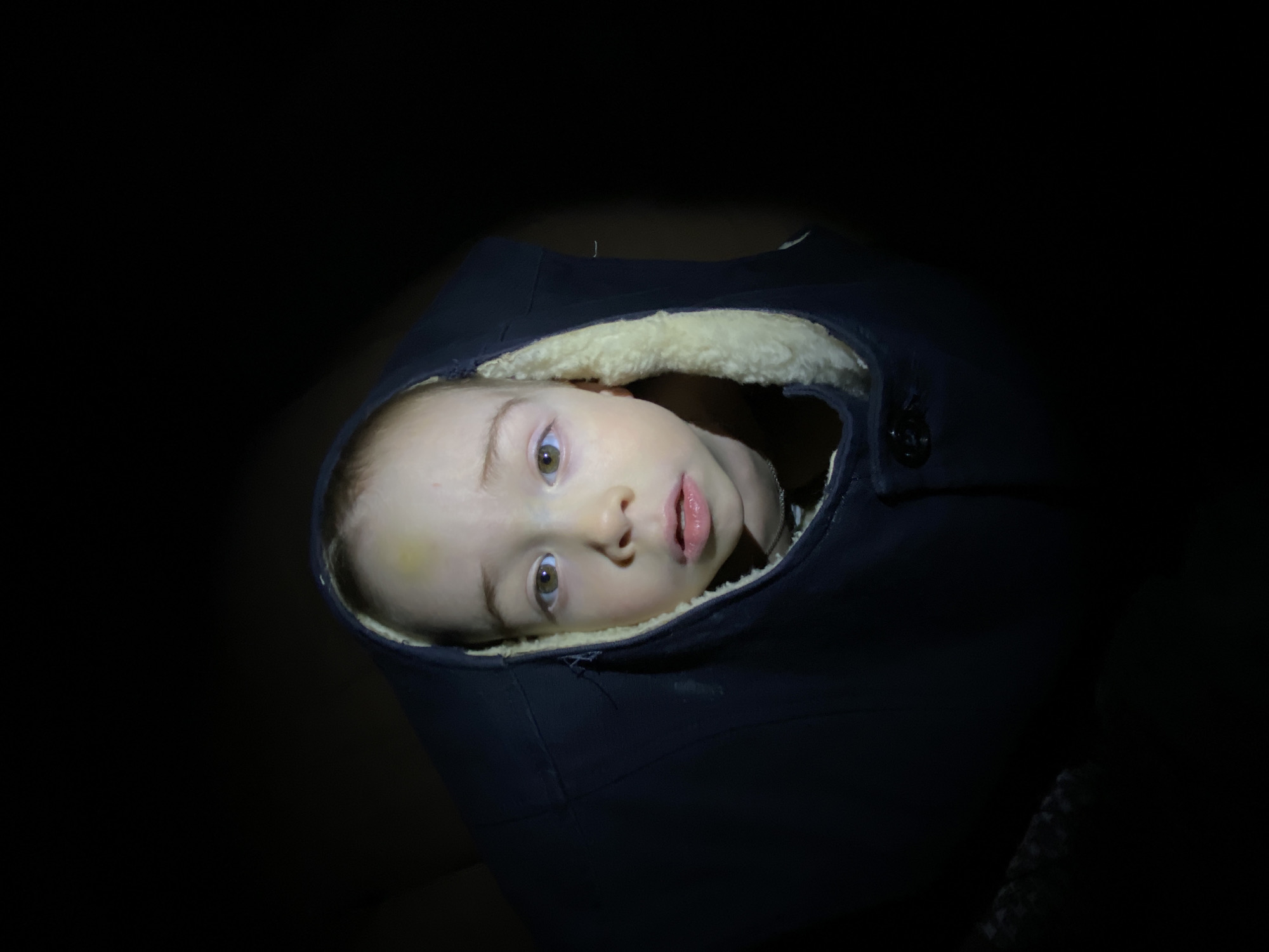 Child photographed in winter clothing in Ольховка, Russia