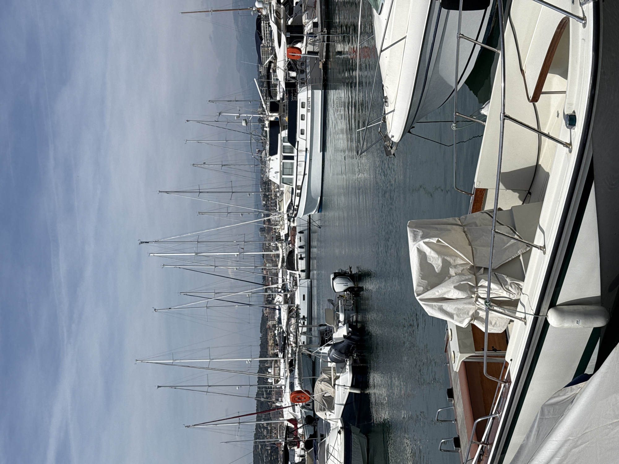 Casual moments captured at Cannes marina on May afternoon