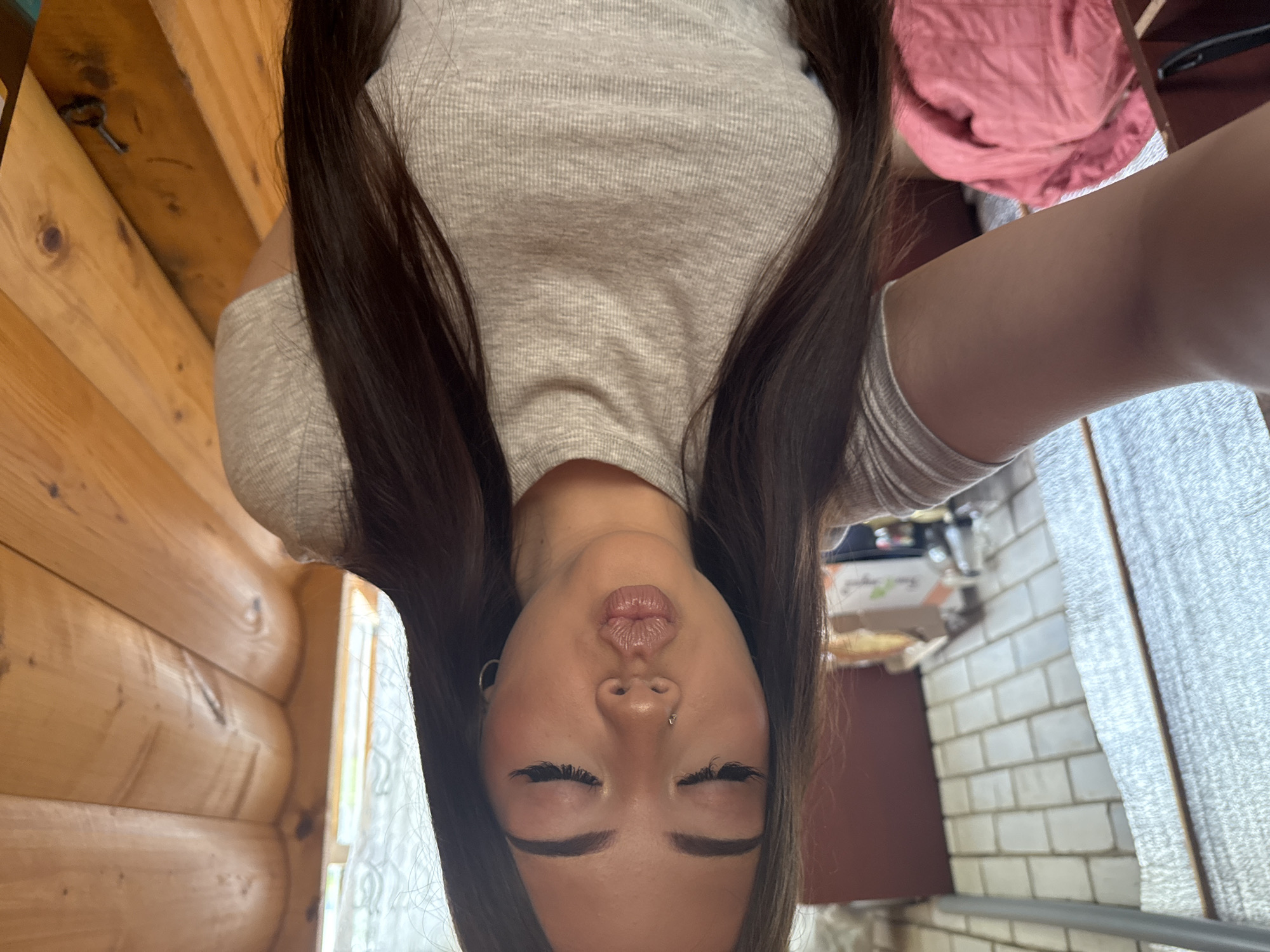 Woman takes series of selfies in Russian home