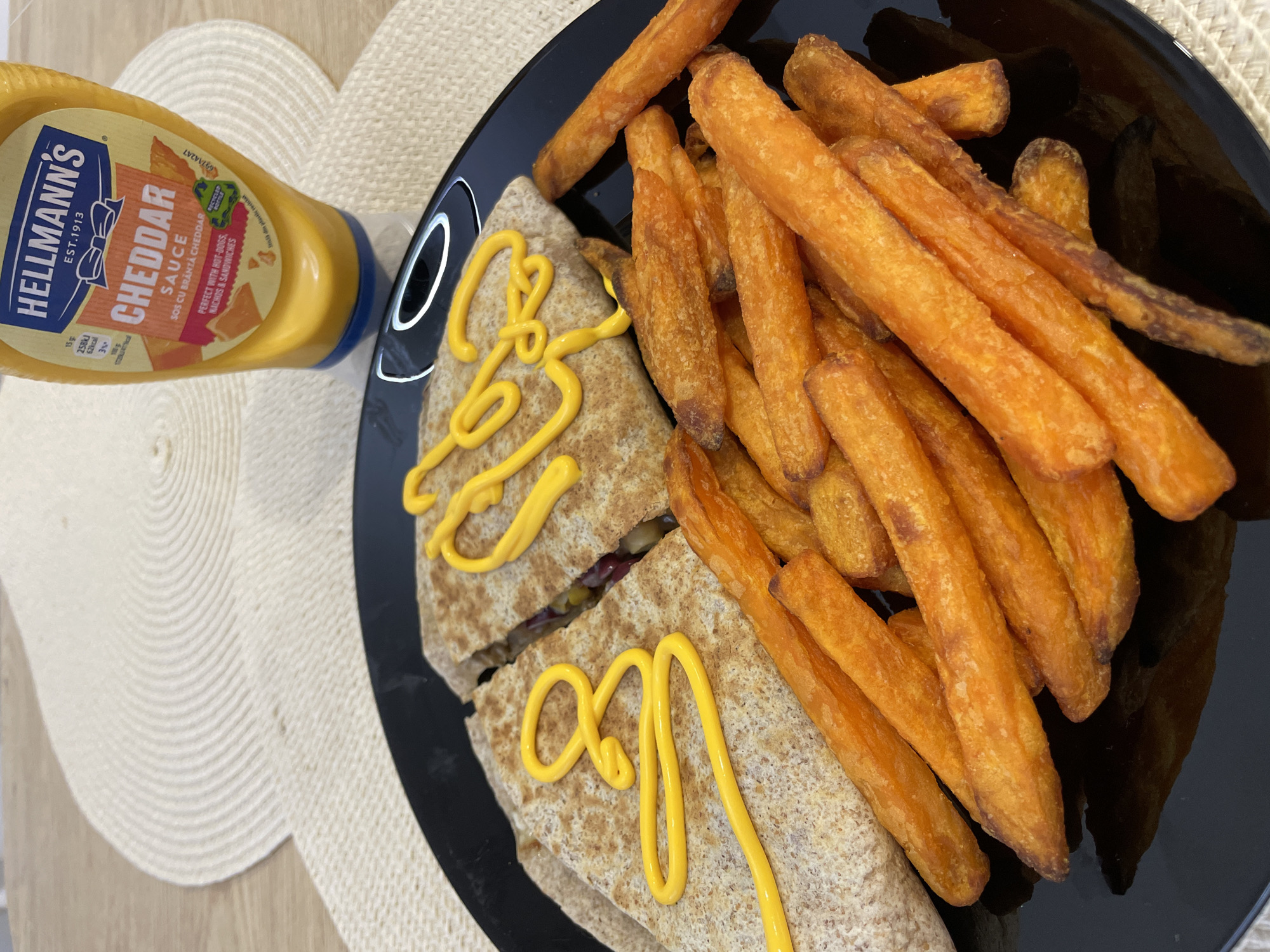 Quesadilla meal with cheddar sauce photographed in Burgas, Bulgaria