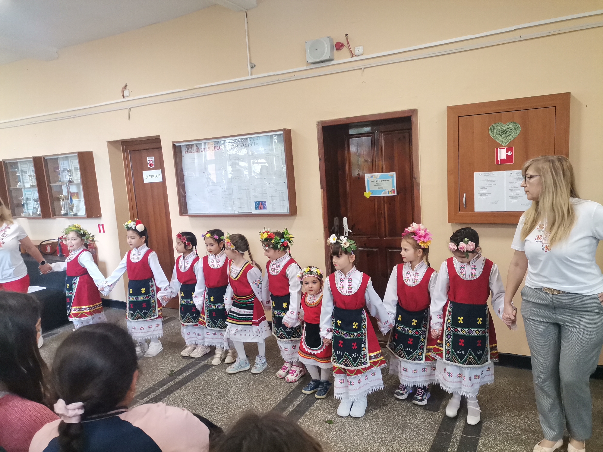 Bulgarian girls perform traditional folk dance in costumes