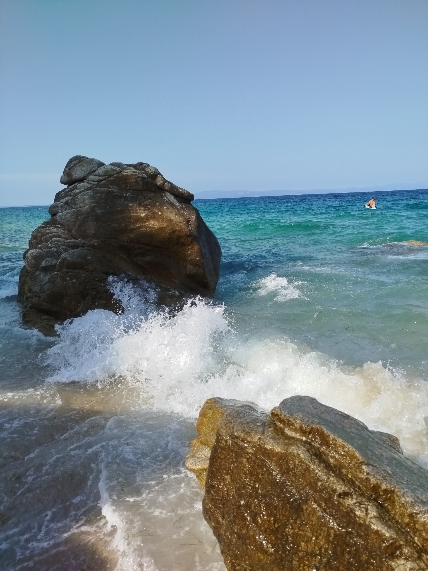 Summer afternoon at a busy Sithonia beach, Aegean coast